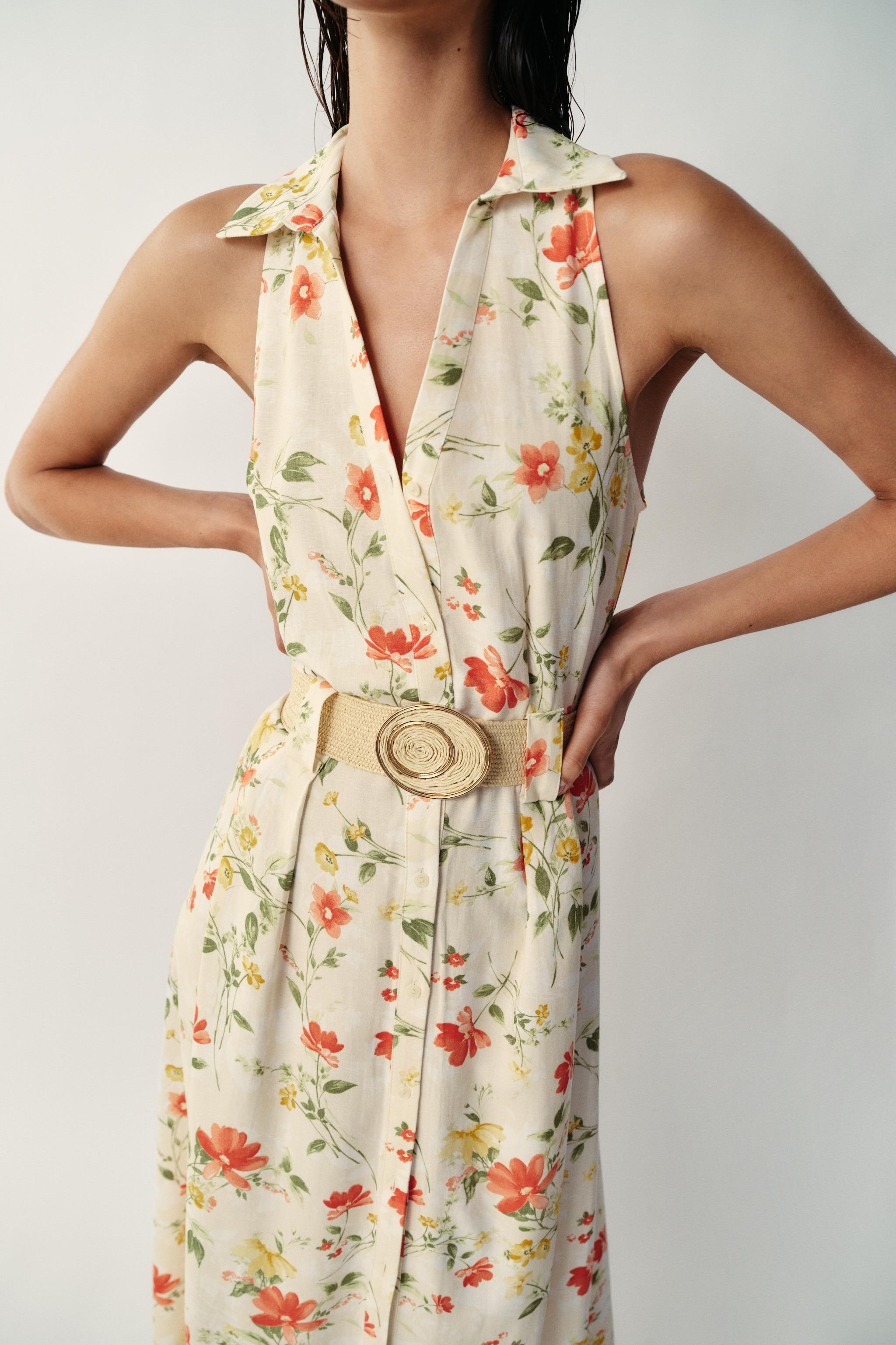 Midi dress with lapel collar, V-neckline, and sleeveless design. Belt detail. Front button closur... | Zara US