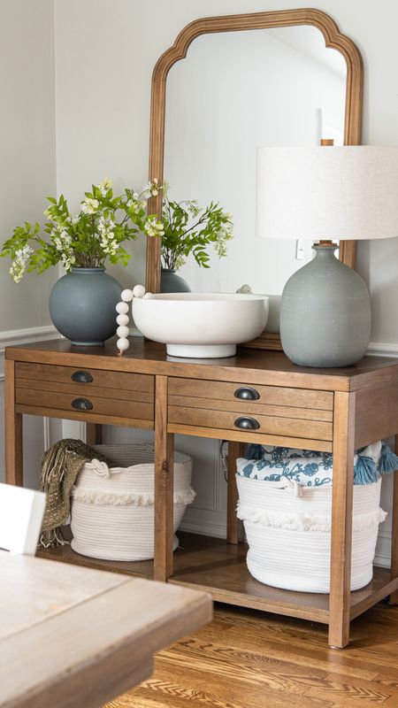 Coastal style home decor for your dining room, including neutral tones, console table, oversize mirror, decorative bowl and beads, storage baskets, and more home accessories

#LTKfamily #LTKhome