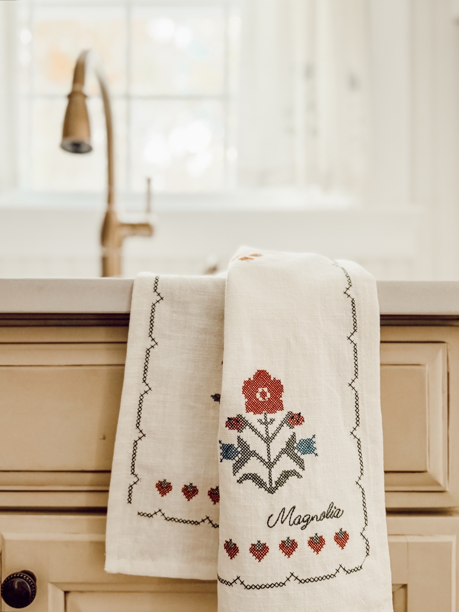A pretty cross stitch kitchen towel with flowers and strawberries.

#LTKHome #LTKSeasonal