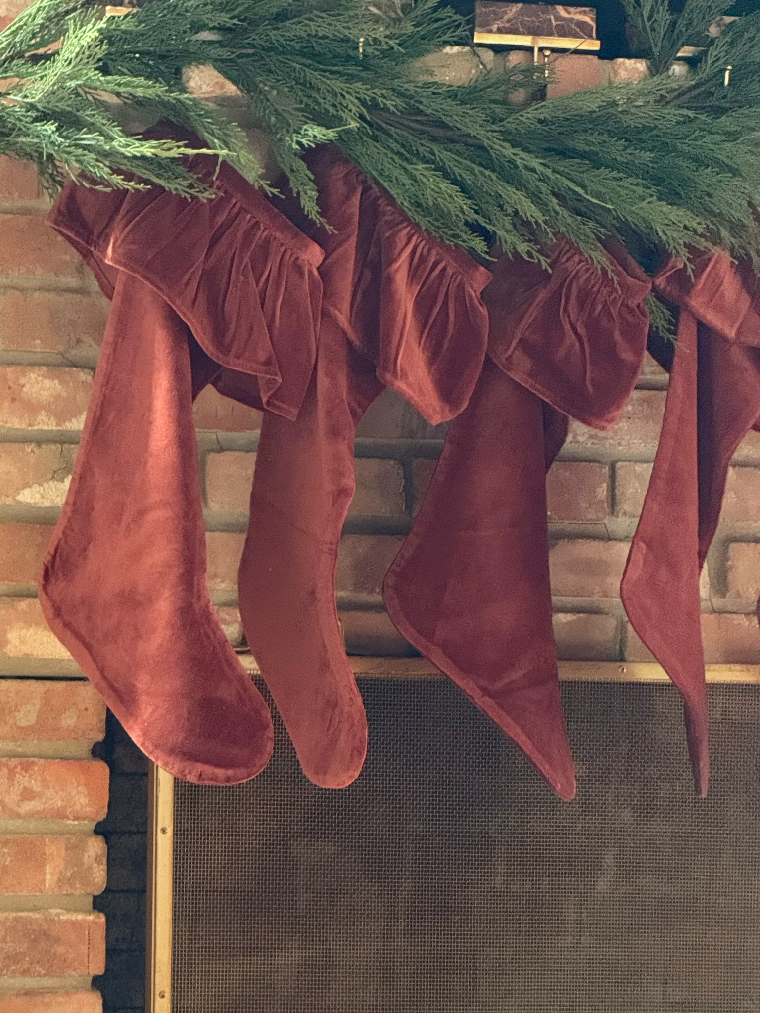 Burgundy Christmas stockings, faux garland, and red marble stocking holder 

#LTKHoliday #LTKGiftGuide #LTKHome