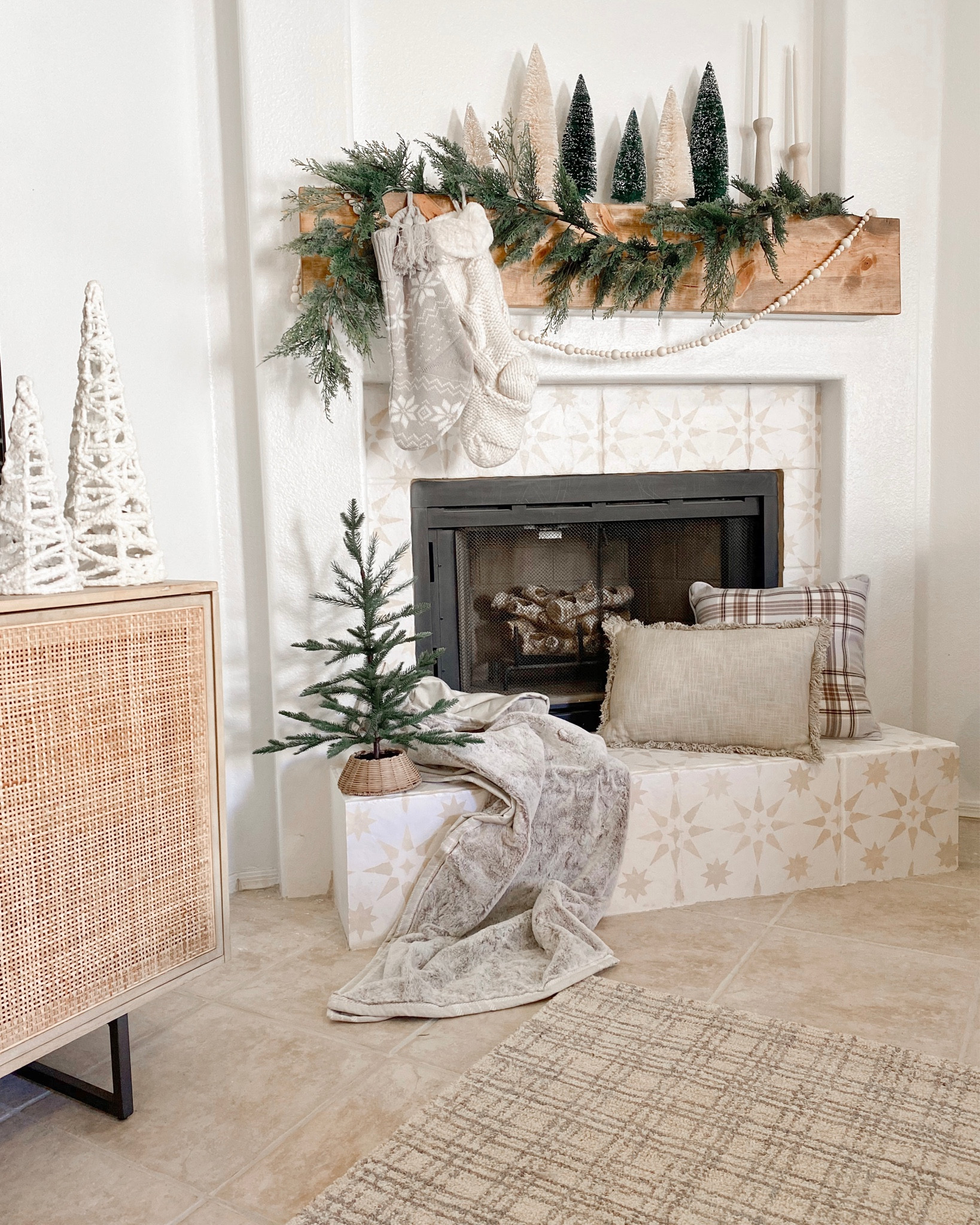 Christmas decor. Christmas fireplace decor. Holiday decor. Christmas garland. Christmas tree decor. 

#LTKhome #LTKSeasonal #LTKHoliday