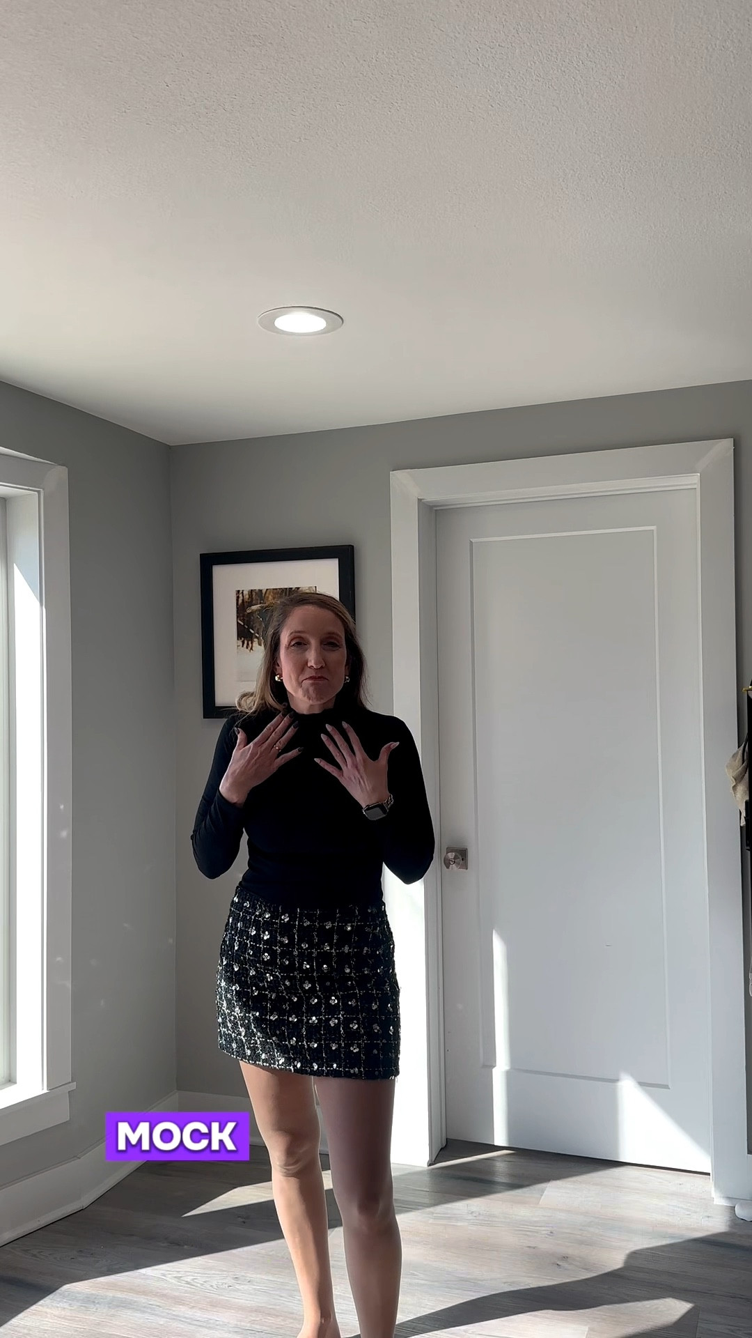 🖤✨ I am officially obsessed with pairing this black turtleneck staple with a glitzy tweed mini. It’s the perfect way to feel intentional and polished without overthinking your outfit. There is nothing more unsettling for others than a woman who is comfortable in her own skin—and a little bit of sparkle definitely helps! Shop my full look on my LTK! 🛍️ #StyleStaples #TweedSkirt #BlackTurtleneck #ClassicFeminine

My Elevated Tweed Style Breakdown
• The Foundational Layer: I’m wearing a black fitted turtleneck as my base. Its sleek, body-skimming silhouette provides the perfect neutral canvas to let the skirt shine.
• The Statement Piece: I’ve paired the basic knit with a black and silver embellished tweed mini skirt. The textured fabric and shimmering details add that signature "girly" and sophisticated energy to the ensemble.
• The Versatility: This combination is my favorite way to be "uncontrollable"—taking a high-fashion skirt and making it approachable for a social afternoon or a dinner out just by using my favorite closet basics.

Black fitted turtleneck sweater, black and silver embellished tweed mini skirt, black long-sleeve layering shirt, feminine professional wardrobe, classic closet staples, neutral monochromatic style, tweed skirt outfit ideas, empowered woman look, winter-to-spring transition style, LTKstyle

#LTKgrwm #LTKSeasonal #LTKootd