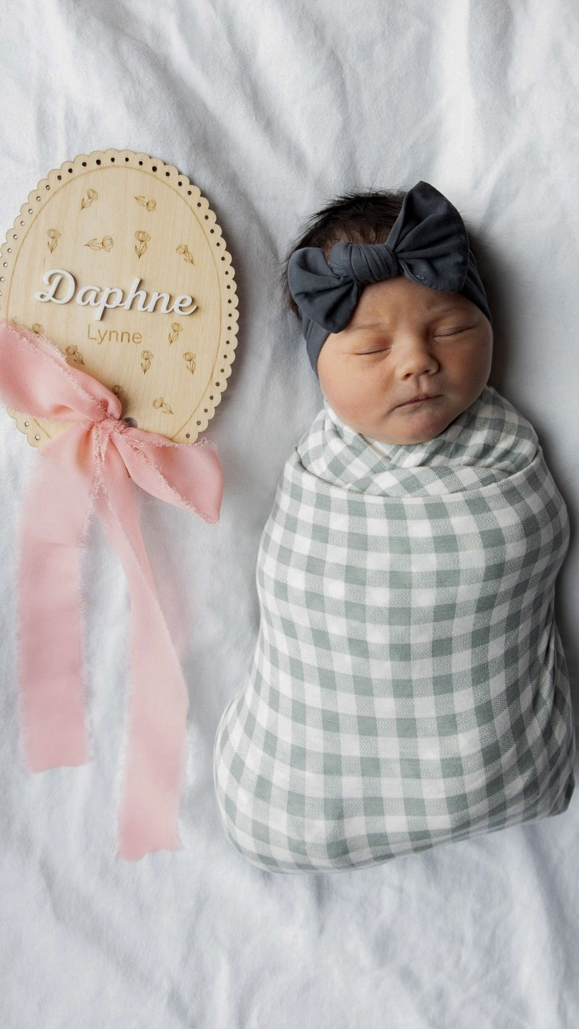 Hospital photos with baby- make sure to bring their custom name sign and a swaddle for pics! 

#LTKBaby