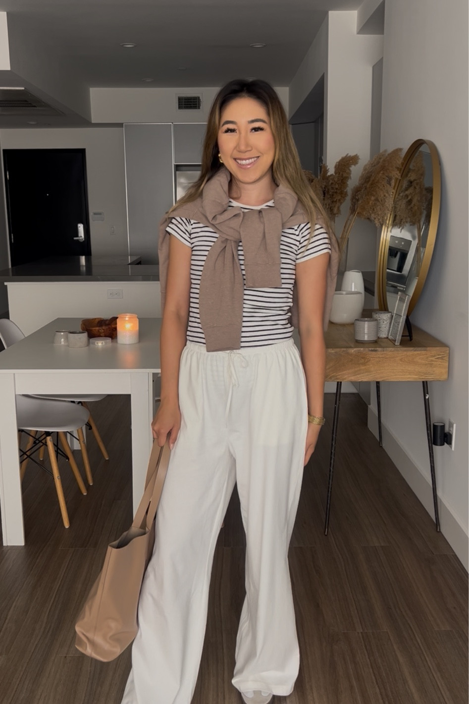 Perfect summer office outfit! Good for a smart casual environment. The striped shirt and cotton pants are elevated by the accessories and cardigan. You can dress up with ballet flats or loafers, but I’ve opted for my adidas Spezials here!

#LTKSummerEdit #LTKFindsUnder50 #LTKWorkwear