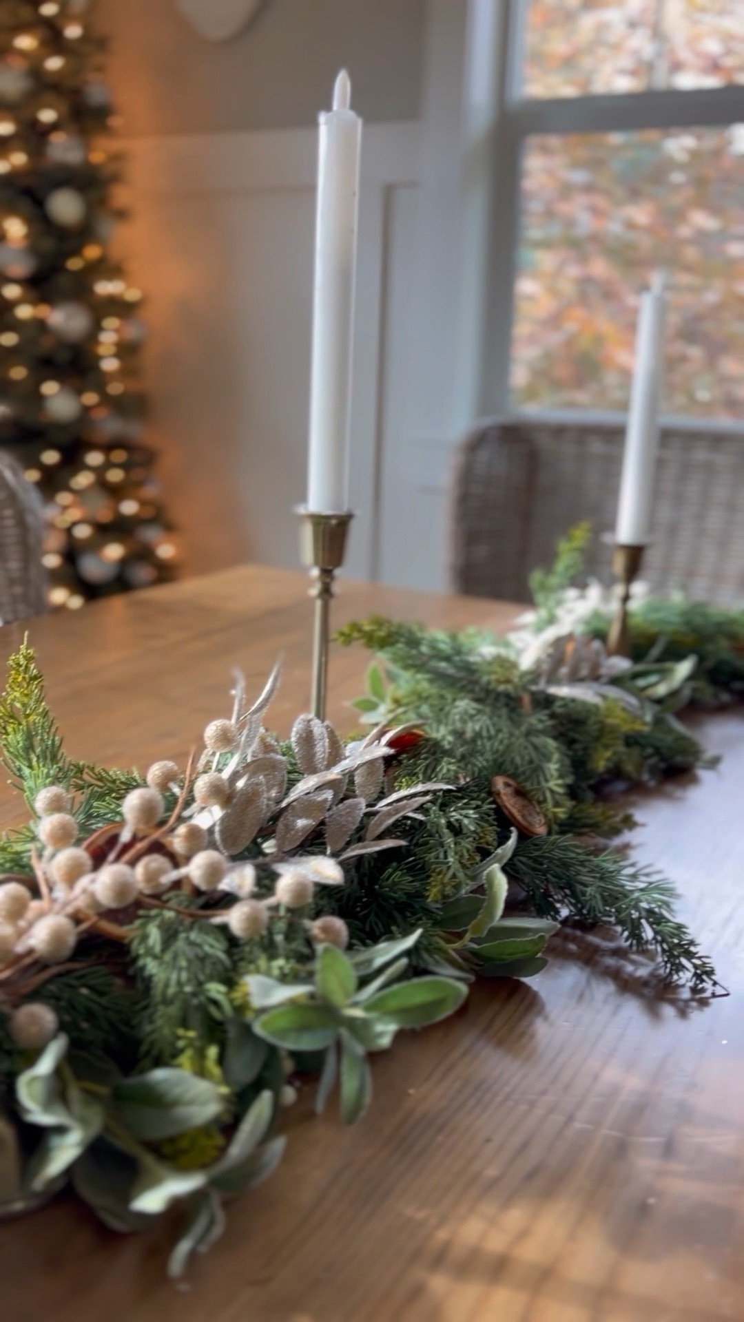 Christmas table decorating with this beautiful garland look. Use a cedar or cypress garland and eucalyptus for the base. Then, layer in dried oranges, candles and touches of gold. 

#LTKhome #LTKSeasonal #LTKHoliday