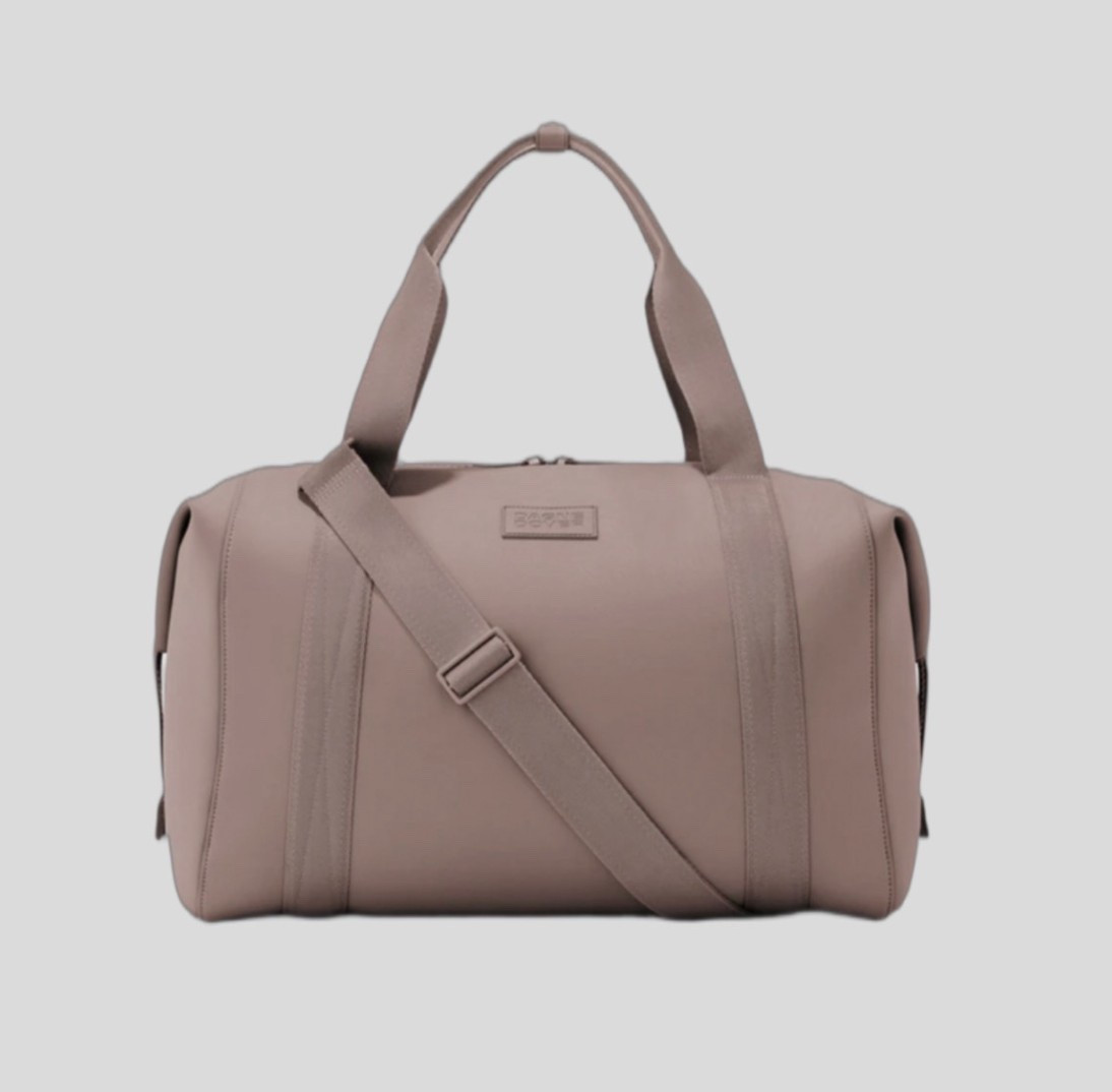 Favorite travel duffle bag from Dagne Dover🤍

#LTKTravel #LTKCyberWeek #LTKHoliday