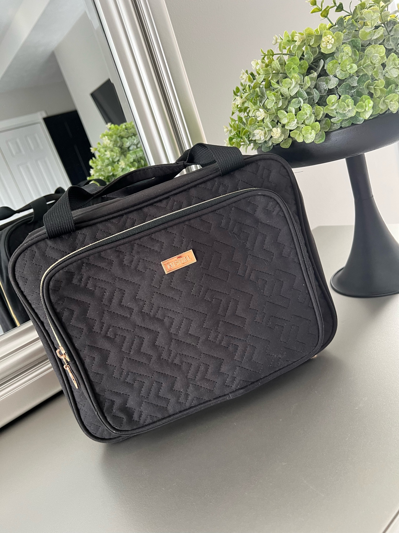 This has to be one of my favorite travel essentials! I absolutely love it and all of the different compartments for your makeup, hair ties, face regimen is perfect! Now I have just one thing with everything in one place instead of multiple mini bags. 🖤

#LTKunder50 #LTKbeauty #LTKtravel