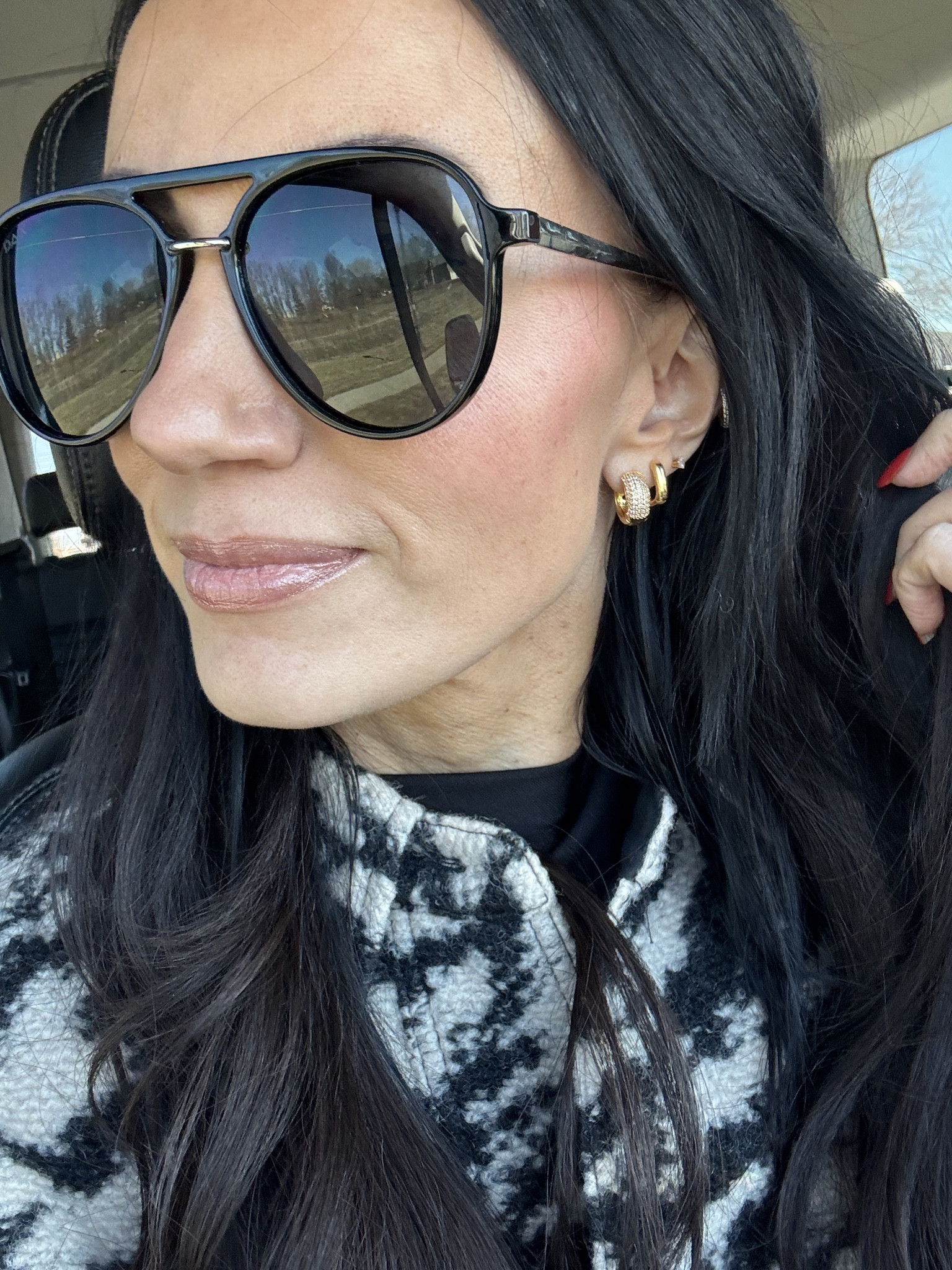 These sunglasses are under $40 and do not get caught in your hair! Earrings are waterproof and so sparkly 

 