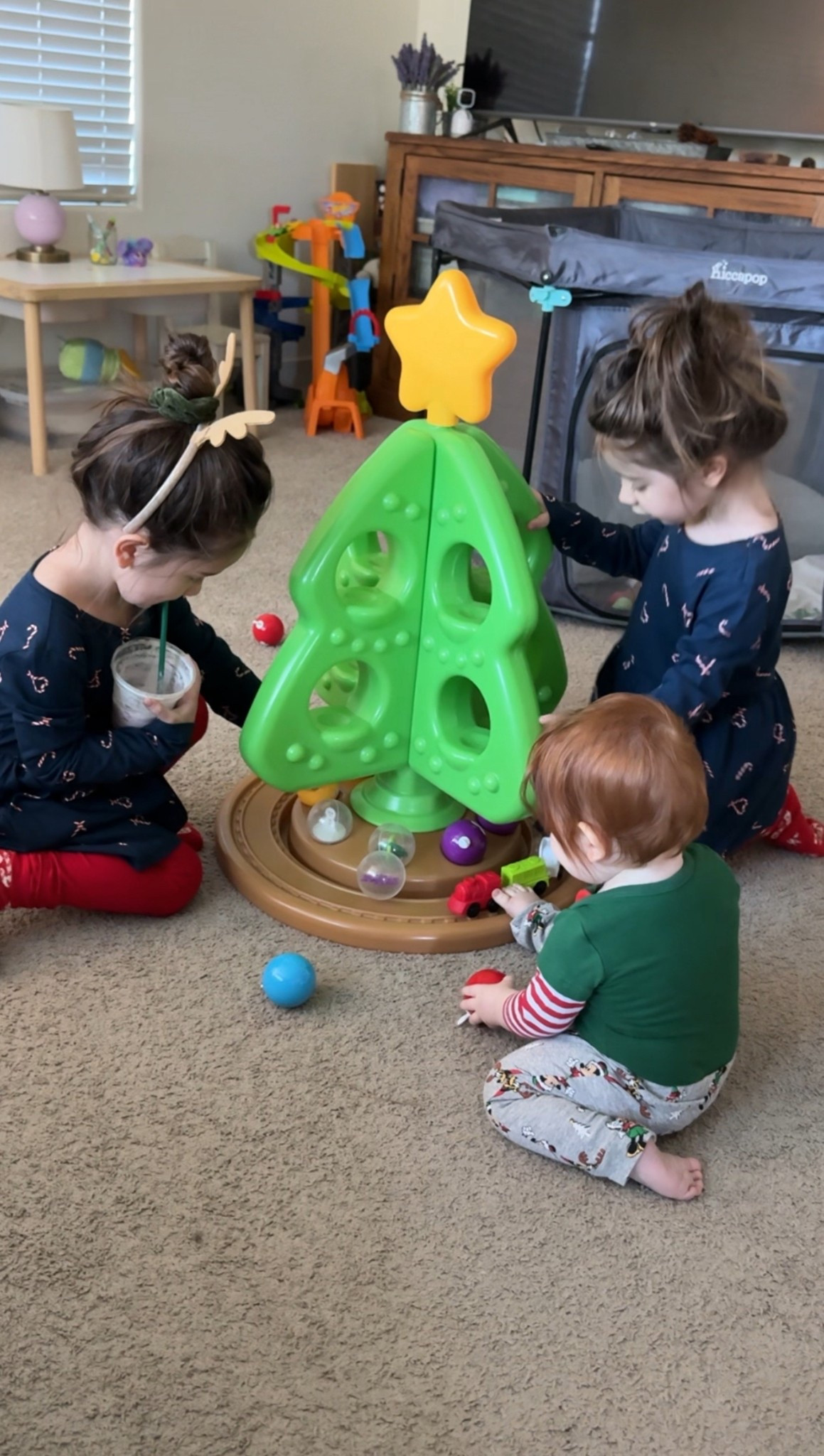 If you’re curious if the Step2 Christmas Tree is worth it ? 
The answer is yes !! 
Our kiddos are 4 yrs old, 3 and 10 months and they’ve all loved playing with it. 

