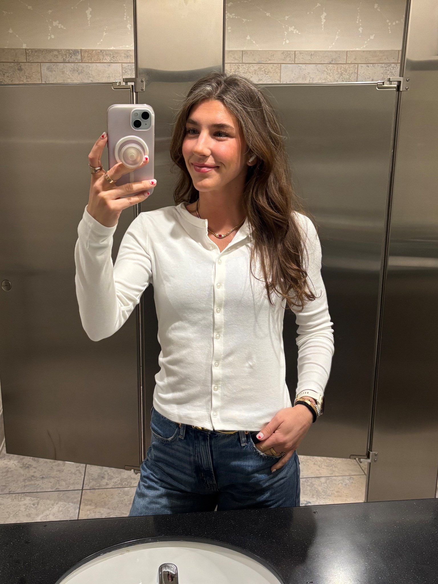 Loving the simplicity of a white tee bit with the added button detailing!🤍  jeans I'm wearing are the gap barrel jeans and they're on SALE, friends!

#LTKdayinmylife #LTKWorkwear #LTKSaleAlert