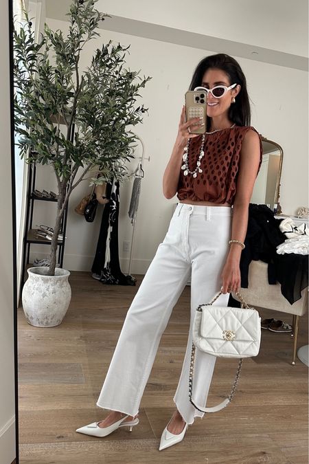 How fun is this top! Perfect for going out, I paired it here with white jeans and these heels that look expensive but are budget friendly compared to others! I'm just shy of 5-7" wearing the size XS top #StylinbyAylin #Aylin 

#LTKItBag #LTKShoeCrush #LTKStyleTip