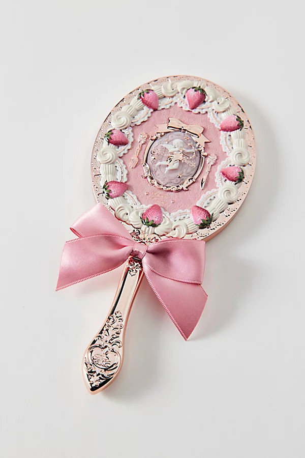 Flower Knows Strawberry Cupid Handheld Mirror in Milky Pink at Urban Outfitters | Urban Outfitters (US and RoW)