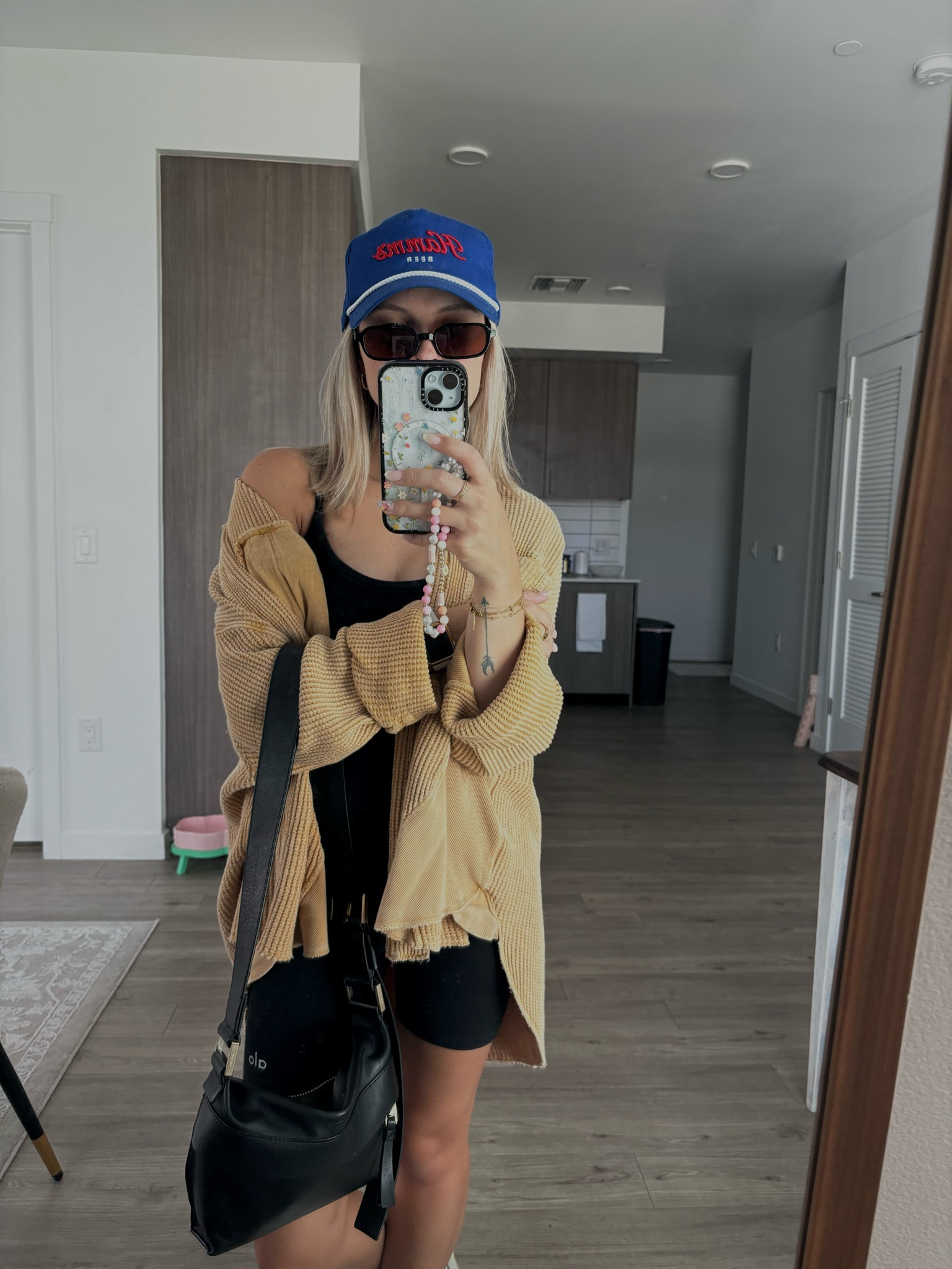 Alo onesie, free people shacket paired with a trucker hat and sneakers 

#LTKActive #LTKstyletip