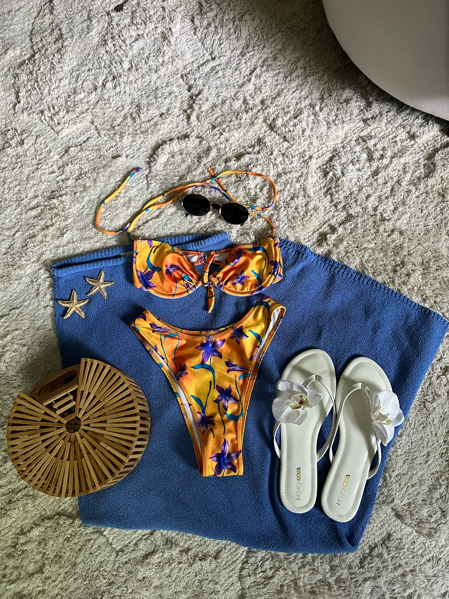 loleia swimsuit in size small (couldve sized up to medium in top), skirt size small, shoes fashionnova, bag is nastygal but linking similar