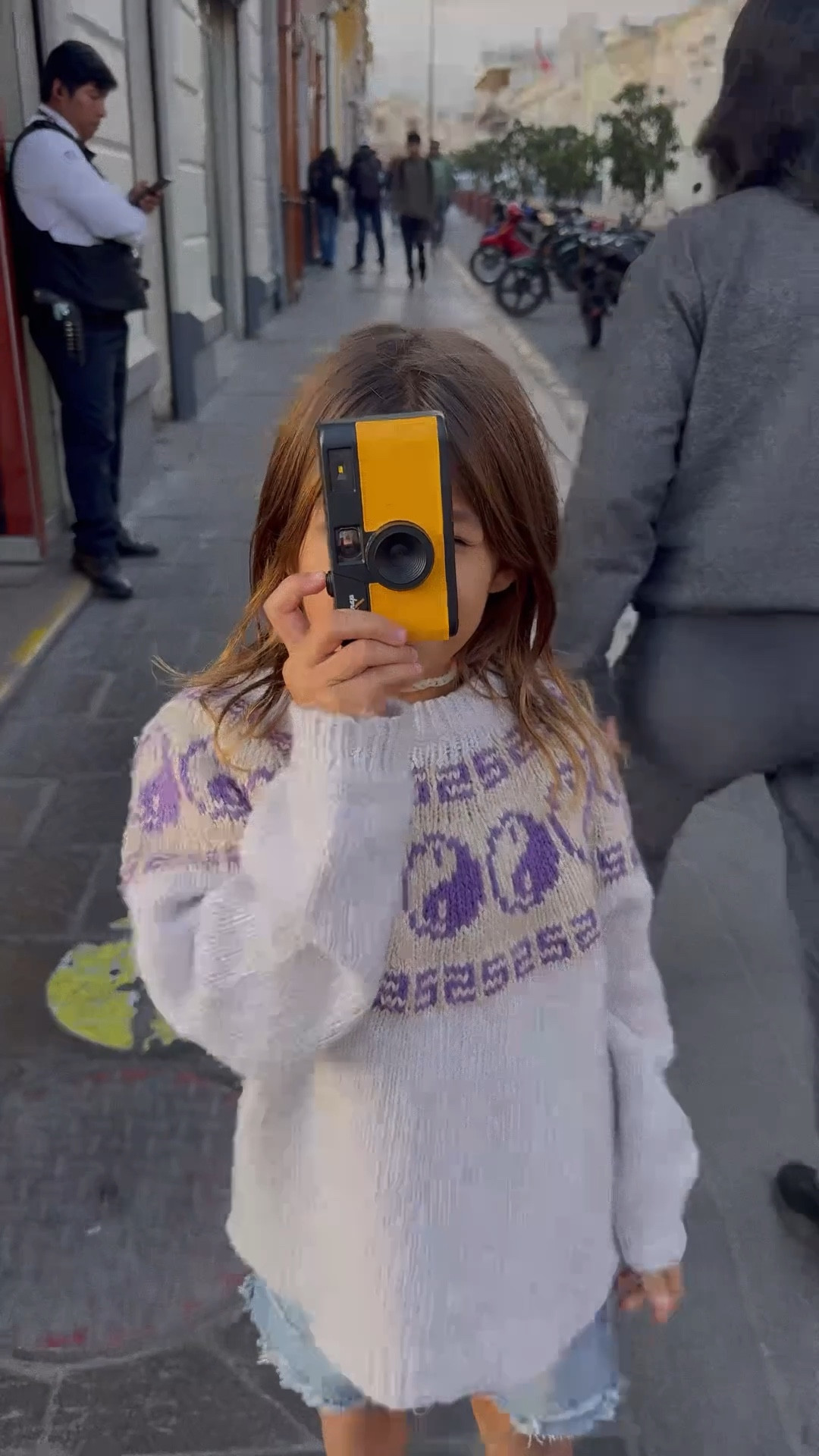 Levy’s Digital Film Camera! It’s for adults but great for kids too. It comes with a tiny memory chip, you get the photos by exporting it to your computer or iPhone with a memory card reader (I added it too)