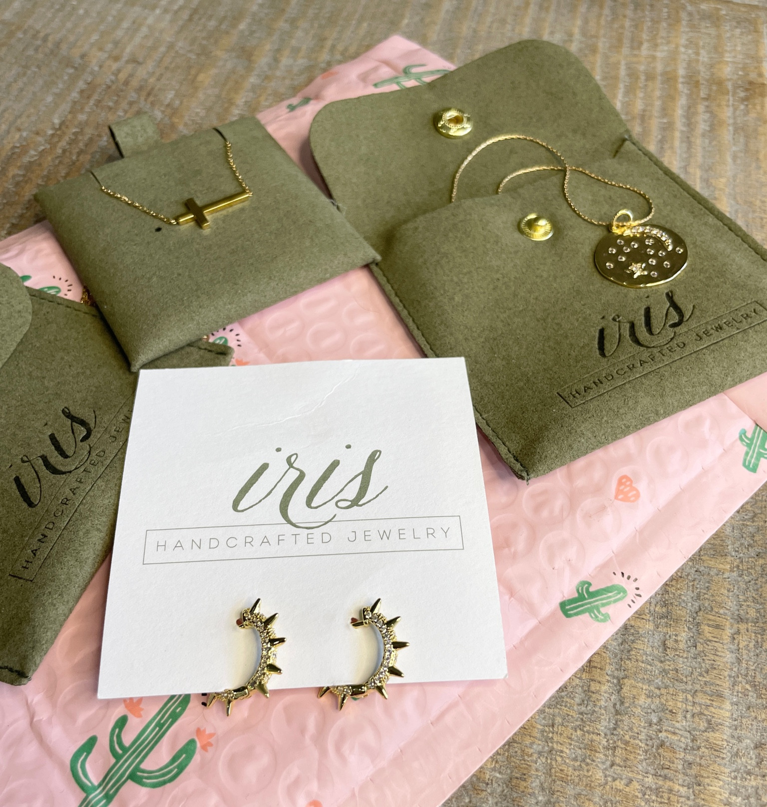 Gold spike hoops. Horizontal cross gold necklace. Moon and stars necklace. Dainty jewelry. 

#LTKparties #LTKGiftGuide #LTKHoliday