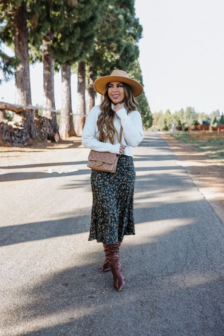 Thanksgiving outfit. Wearing xs in this floral satin midi skirt and XXS in the cropped sweater. Boots are on sale and Run TTS

Fall outfit
Holiday outfit
Midi skirt
Turtleneck sweater 
Leather boots



#LTKunder50 #LTKHoliday #LTKSeasonal