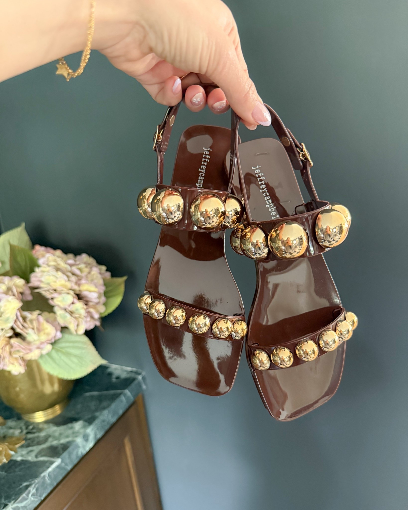 Obsessed with these jelly sandals! And they’re actually comfortable 🙌🏼 I’m a 7 1/2 and the 7 fits perfectly. Dark Brown Gold!

#LTKSwim #LTKSeasonal #LTKootd