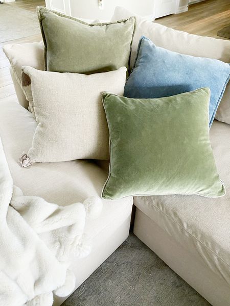 Perfect pillows for spring 🩵🤍💚

Spring decor 
Pillow combos 
New pillows 
Spring sofa 
Family room decor for spring 
Arhaus