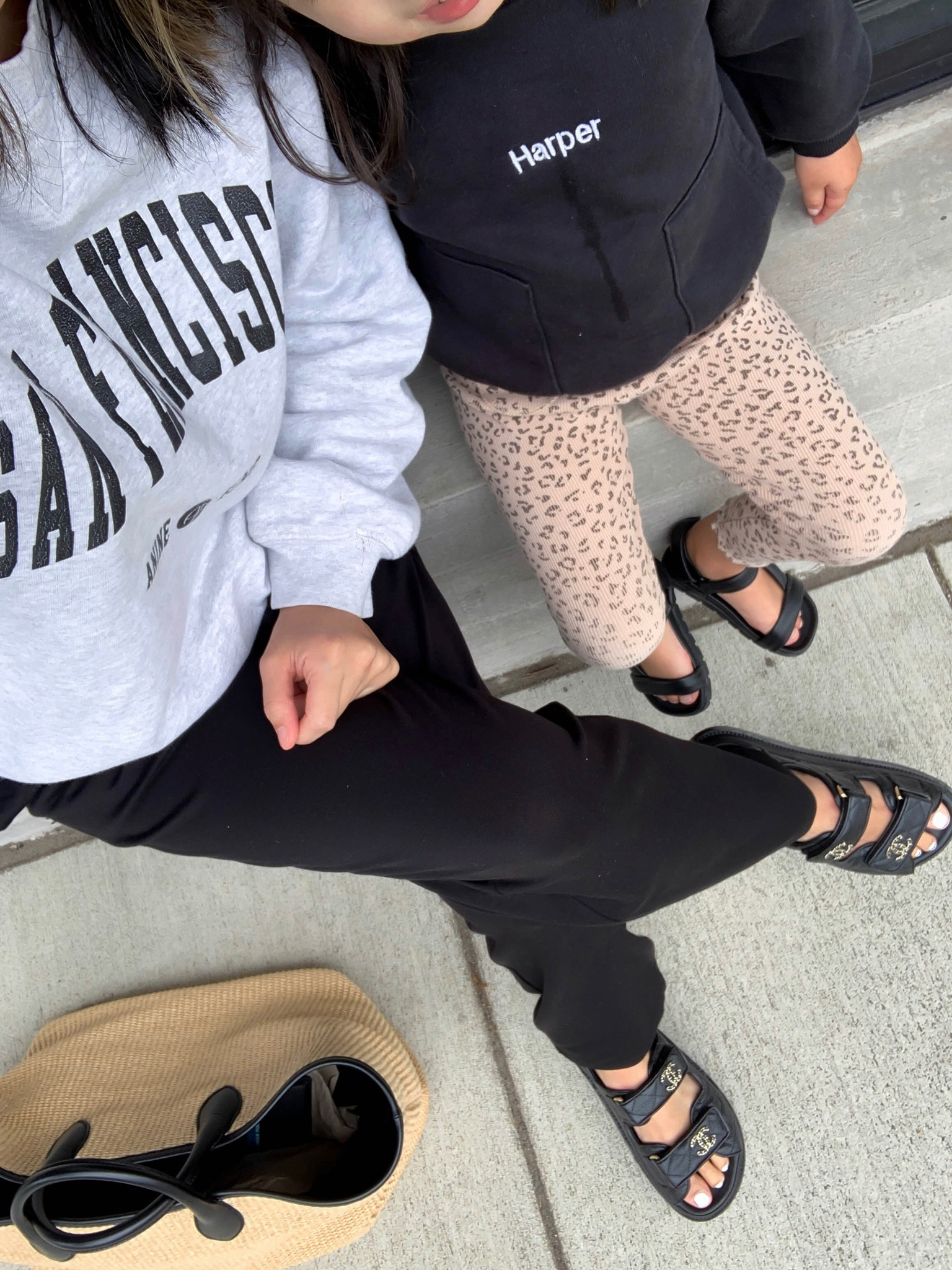 Mom-on-duty outfit. Anine Bing sweatshirt. Chanel dad sandals. 

Sweatshirt - Anine Bing xs
Pants - Eileen Fisher xs
Sandals - Chanel 35. Size up a half size. 
Tote - Khaite
Sunglasses - YSL