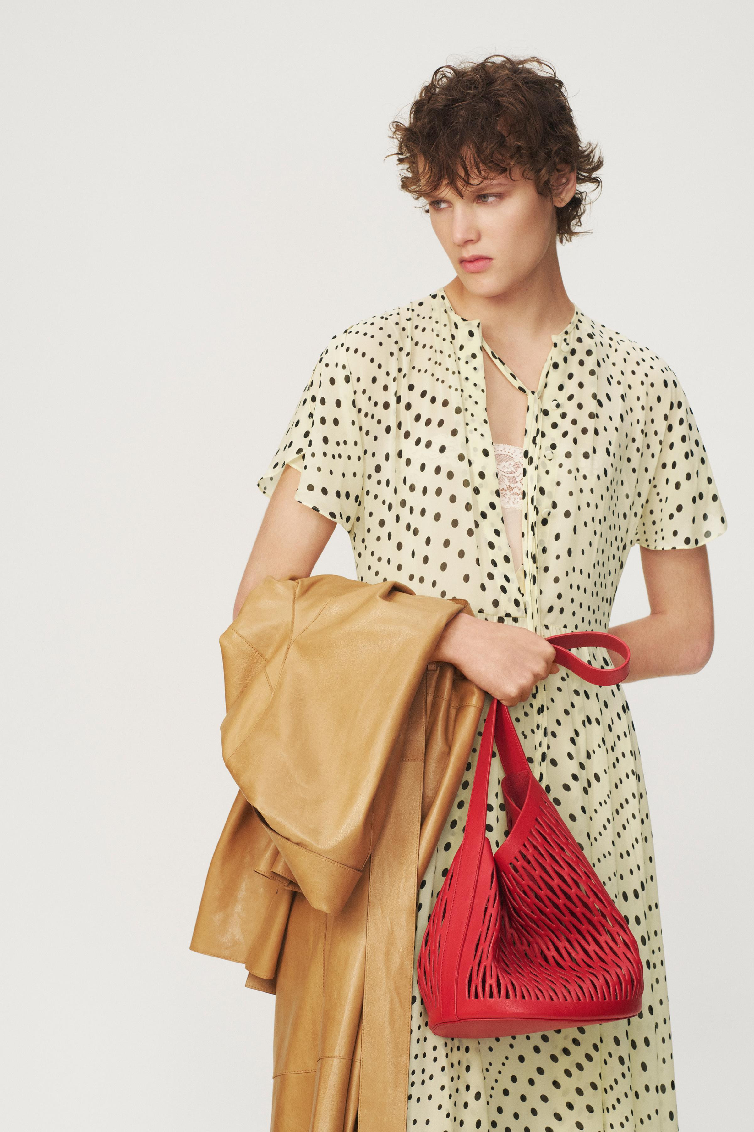 ZARA WOMAN COLLECTIONMidi dress with main fabric made from viscose yarn. Round neck with ties and... | Zara UK