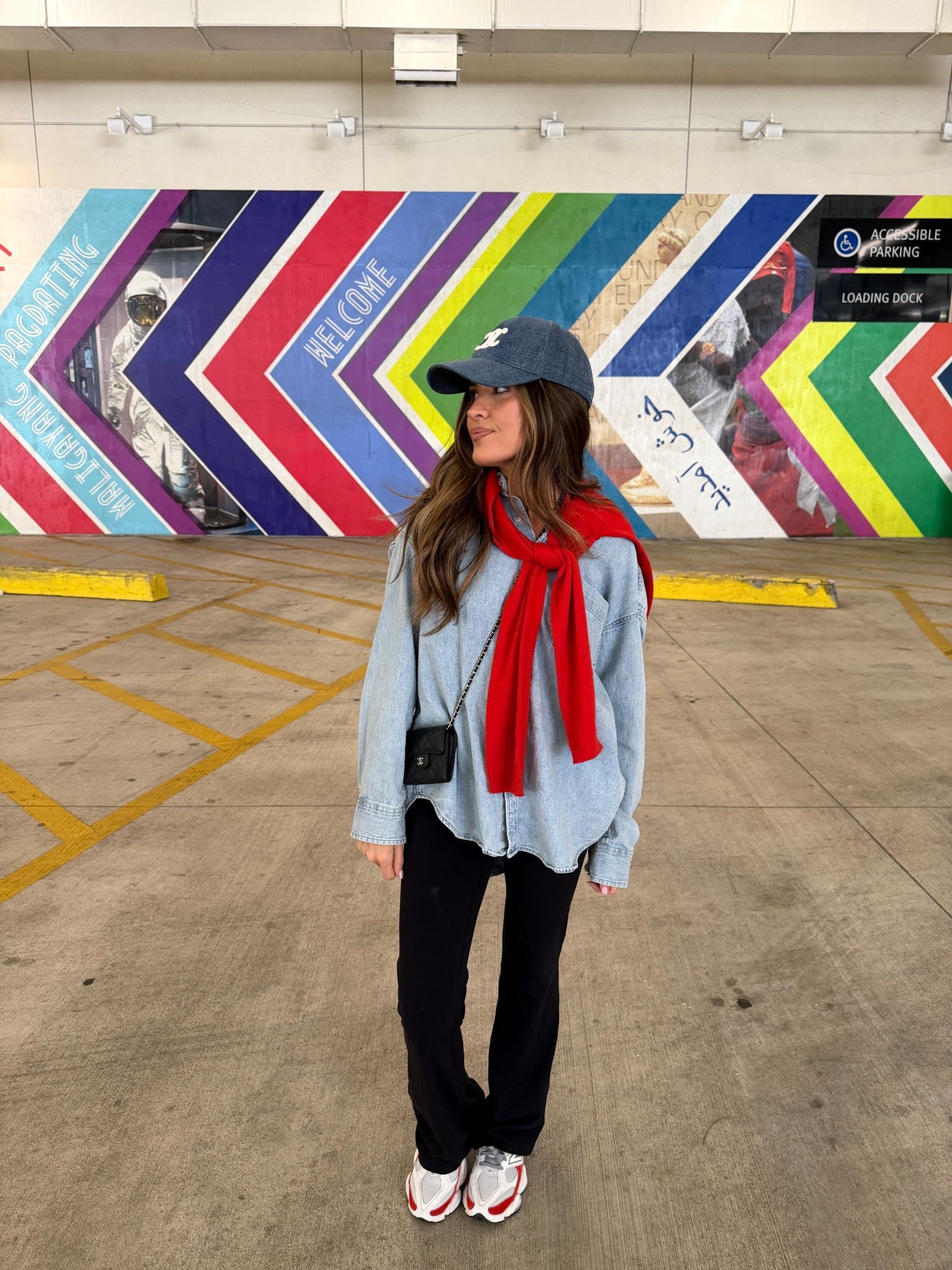 WHat I wore to NCA cheer competition on day two. Celine denim cap, red cardigan sweater from @Aritzia. (Small) my favorite denim top from @Aritzia (xs), @lululemon flare leggings (4) and new balance sneaker. Chanel coin purse 

#LTKmomlife #LTKPetite #LTKOver40