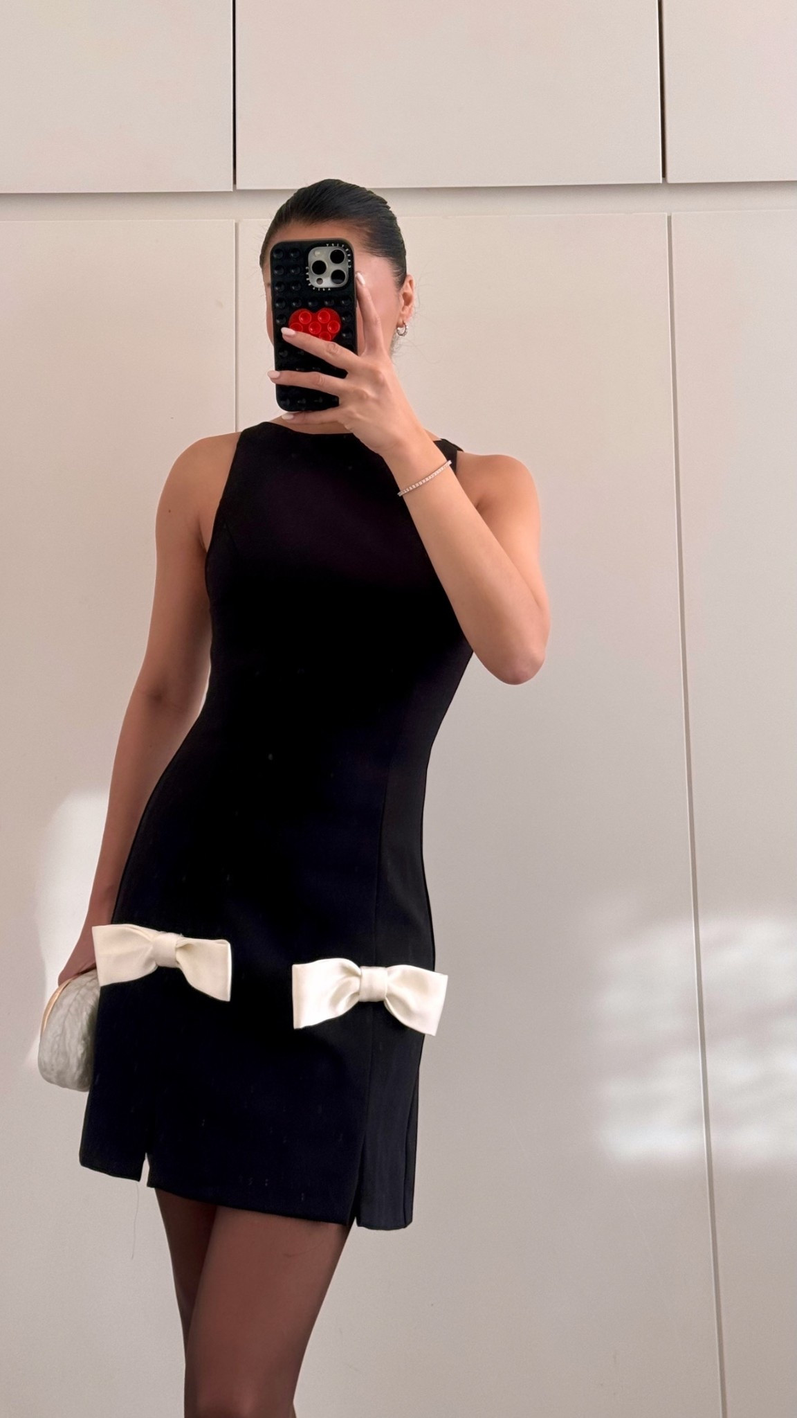 This dress for a holiday party?! Omg so good! I am loving the bows and the slit detail, SO flattering! 

#LTKHoliday #LTKSeasonal #LTKootd