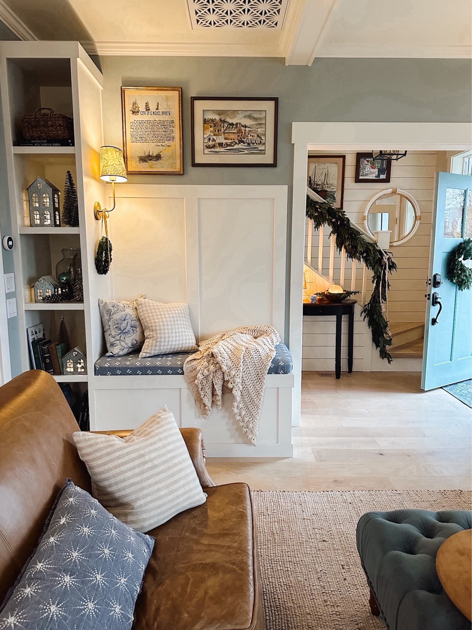 A cozy nook ready for family gatherings and relaxation after the festivities ✨ a chunky knit blanket perfect to curl up in, warm lighting, books within arm’s reach, and simple festive touches. 🤍 Just a few more sleeps! 

#LTKSeasonal #LTKHoliday #LTKhome