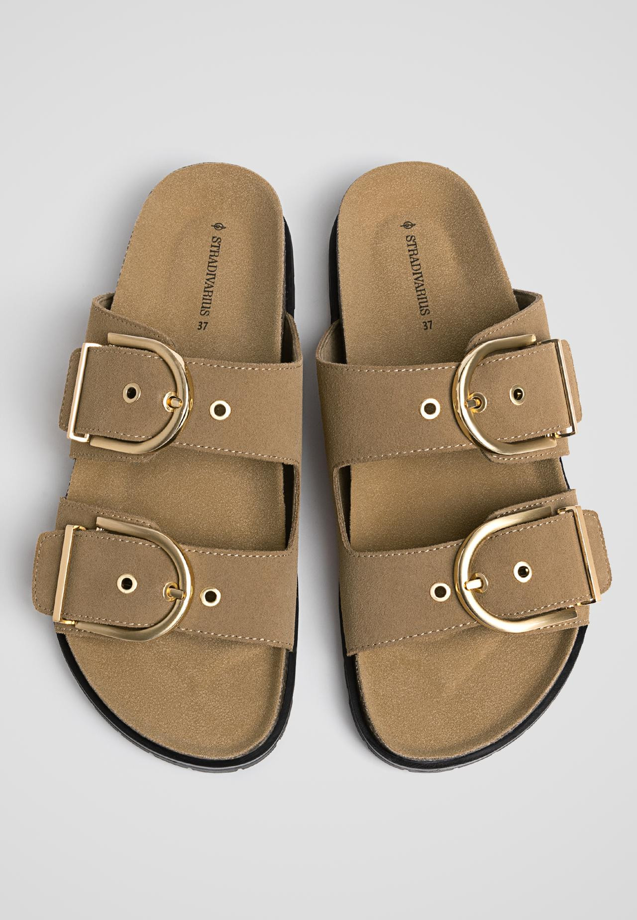 Flat leather sandals available in several colours. Two buckled straps and track soles. Sole heigh... | Stradivarius (UK)