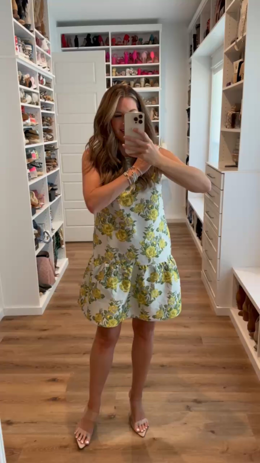 Fall wedding season is here. Chic Amazon dresses in rich fall colors that are perfect for weddings and every special occasion.  In a medium floral sleeveless ruffle hem dress, clear heels and accessories - fits tts. shop dandy, date night outfit, wedding guest outfit, amazon, budget friendly, designer inspired

#LTKWedding #LTKSeasonal #LTKStyleTip