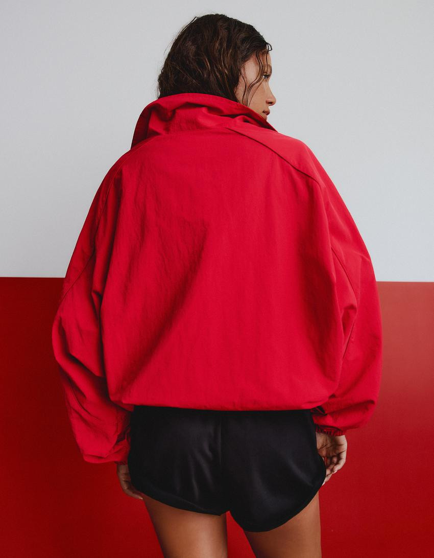 Oversize nylon batwing sleeve jacket - Women | Bershka UK