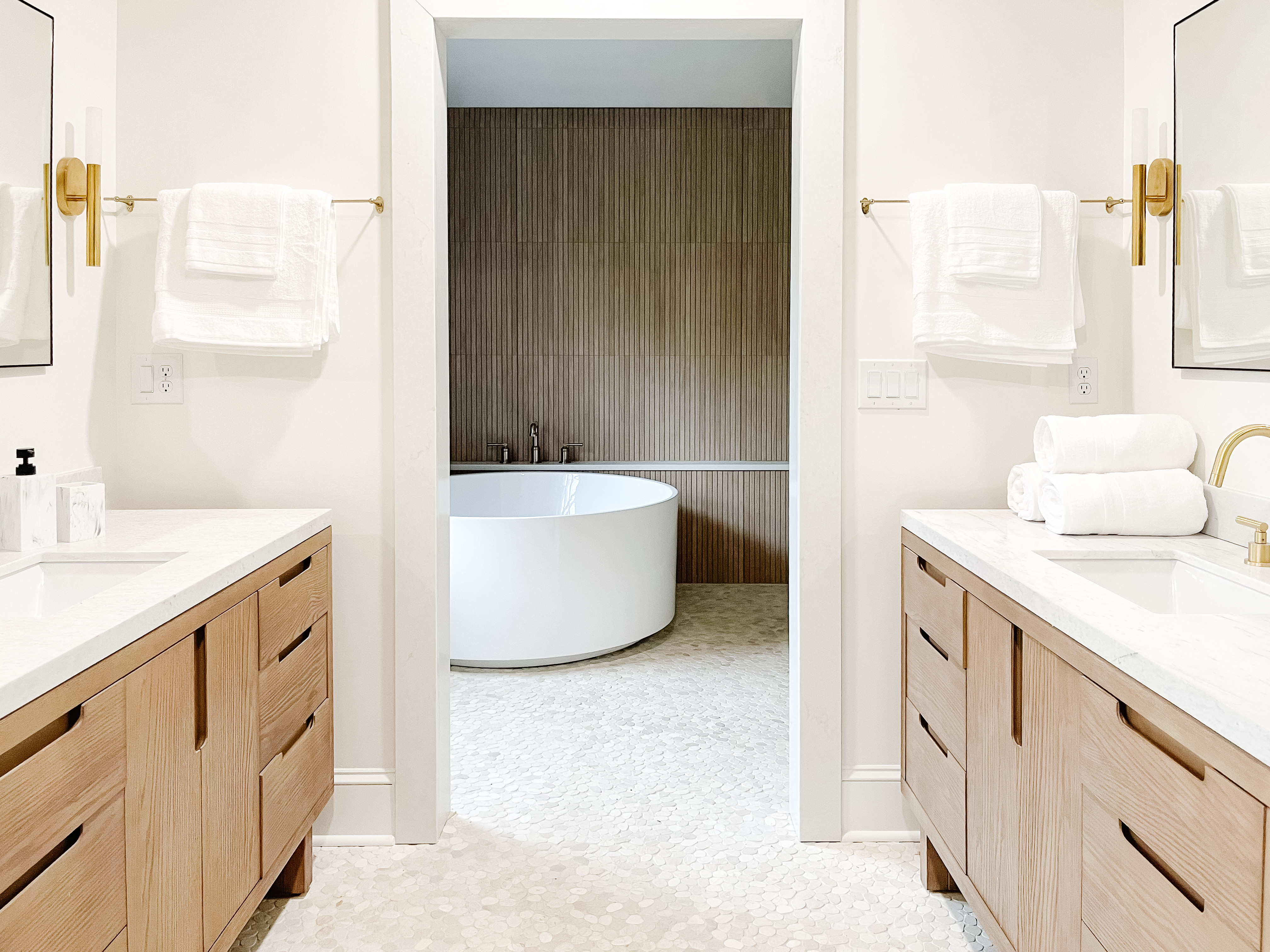Spa day, every day ✨ We went all in on luxury for this primary bath — from river stone pebble floors to a two-person sauna and Japanese soaking tub. Tap to shop pieces that bring that same resort-level serenity home — think plush towels, natural textures, and soft ambient lighting. 

 #LTKHome