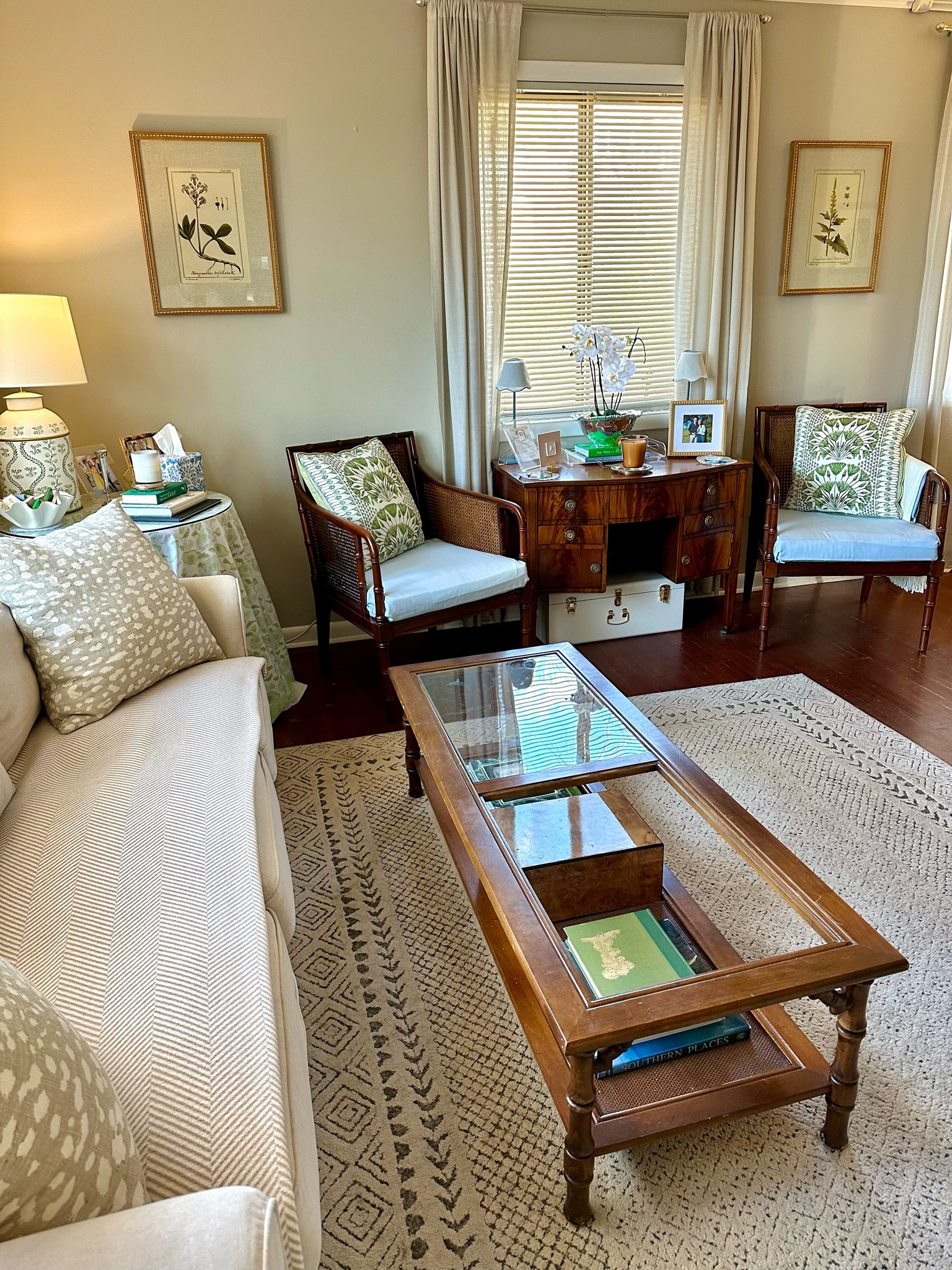 Overview of our living room including the rug I’d love to replace and the missing glass on our coffee table 😂

Our living room so far feels pretty finished, but there are still some updates I’d like to make! Here’s a look at how it looks now to give you an idea of the space we’re working with and the different vignettes set up in the room!

First house, living room, blue and green decor, southern traditional, antique furniture, smaximalist, southern maximalism, affordable home decor, interior design hack, cane furniture, faux bamboo furniture, ikea sofa, skirted table

#LTKfindsunder100 #LTKhome