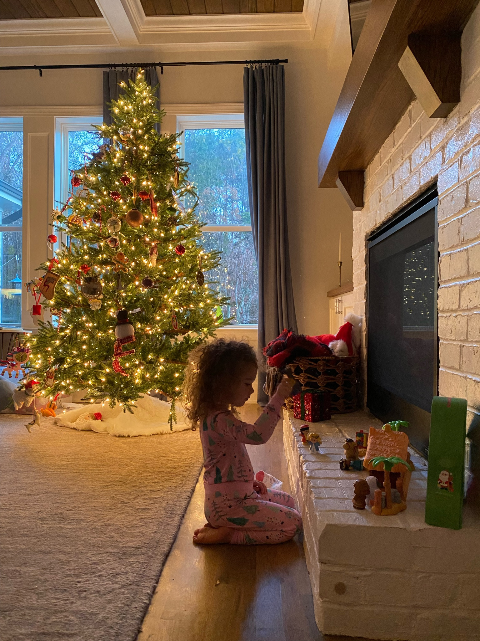 Christmas pajamas. Living room. Traditional Christmas. Blue curtains. Christmas tree. 

Family room rug. Neutral rug. 

#LTKKids #LTKFamily #LTKHoliday