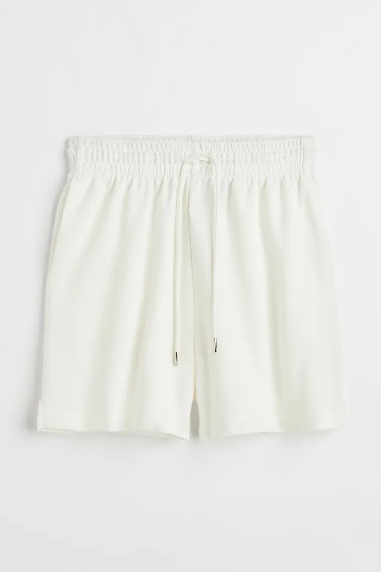 Shorts in lightweight sweatshirt fabric made from a cotton blend. High, drawstring waist with cov... | H&M (UK, MY, IN, SG, PH, TW, HK)