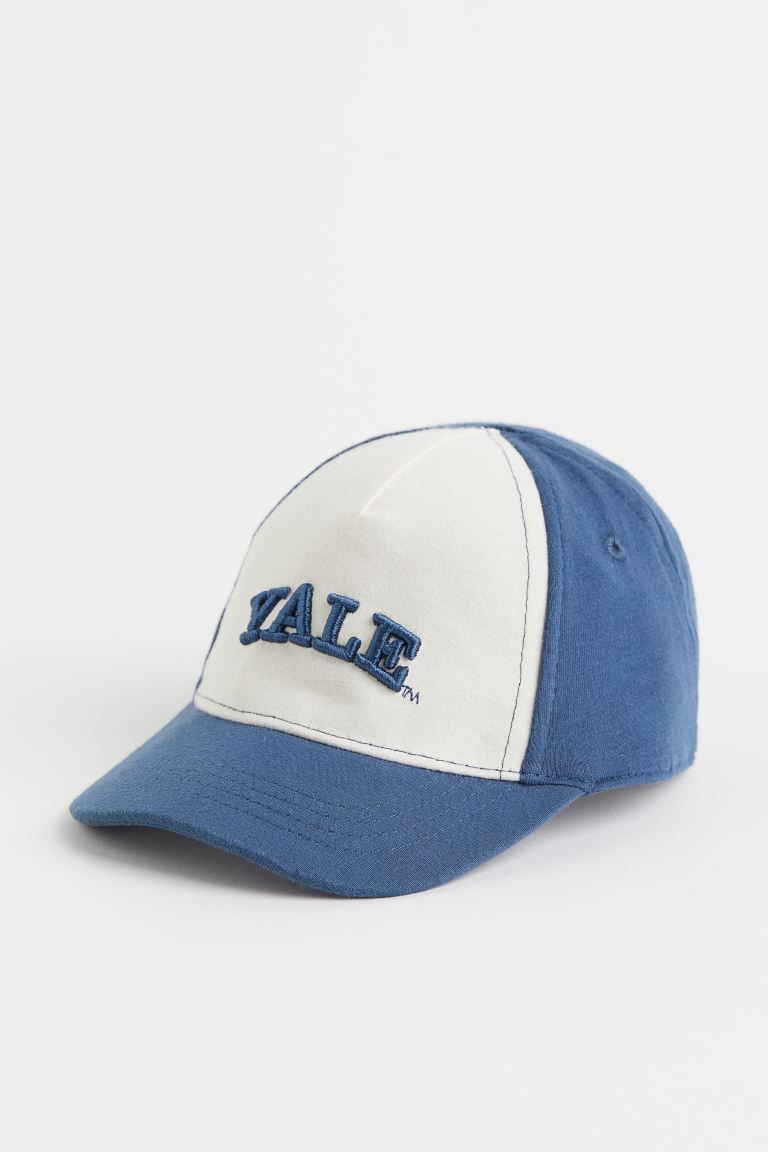 Cap in woven cotton fabric with a printed motif at front. Elasticized section at back.Composition... | H&M (US + CA)