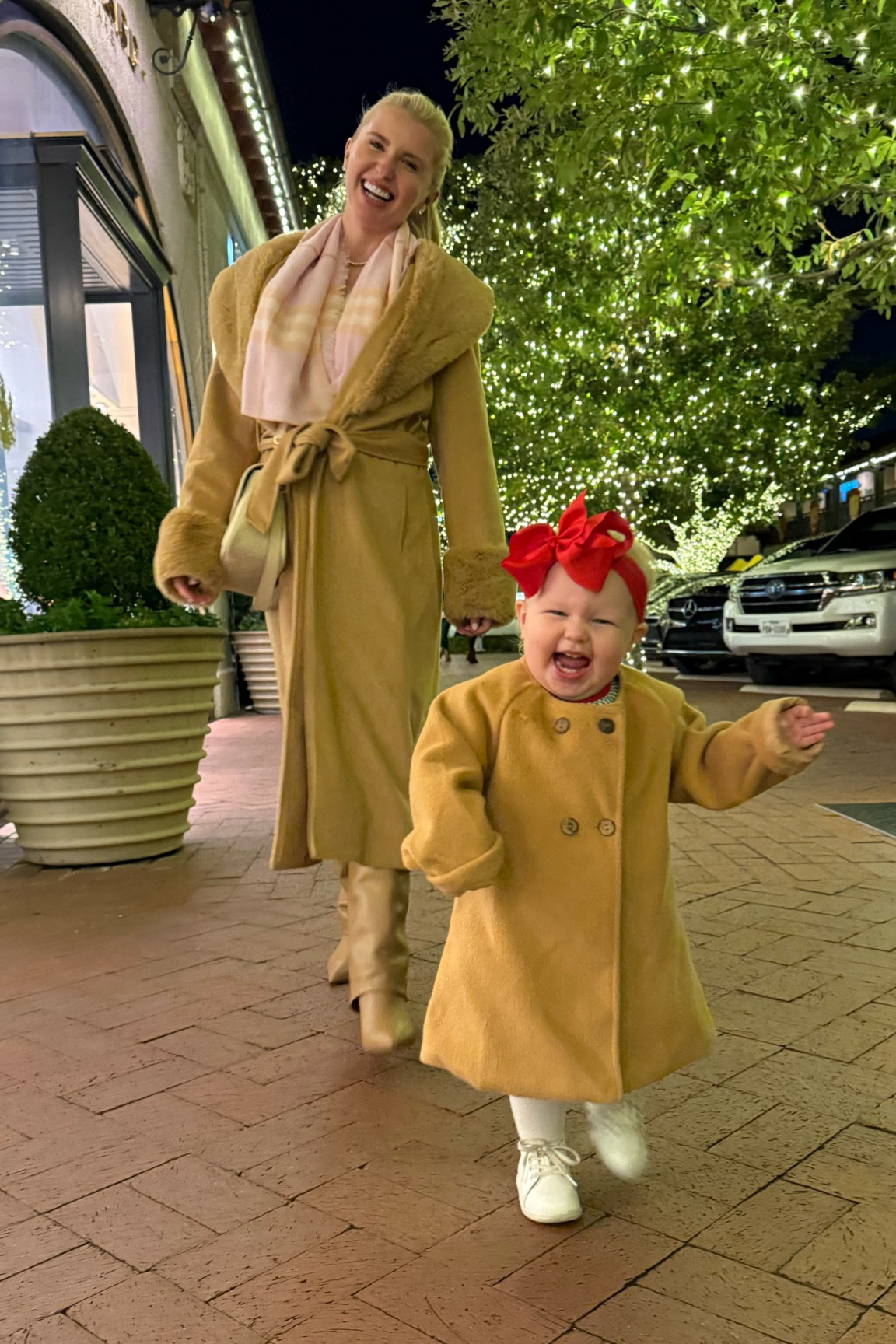 Mommy and baby brown coat date night 😍 LOVE my brown cute - it’s under $60! Lily in her little brown coat made literally everyone at highland park village stop and comment on how cute she was 🥹 

#LTKHoliday #LTKFamily #LTKSeasonal