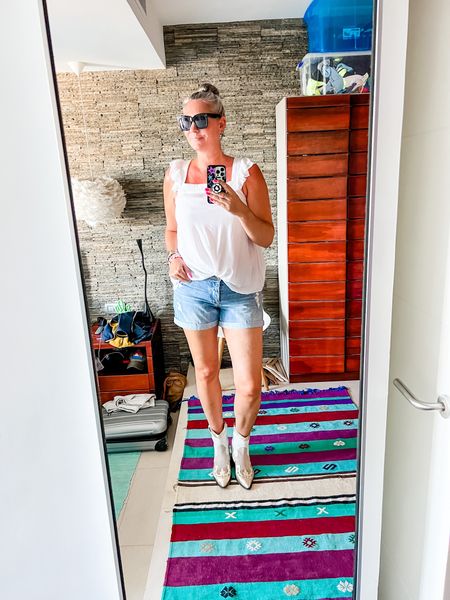 Visiting Las Dalias night market wearing distressed denim shorts (Gap, really old) and a LTS flowy white top with ruffle details and DWRS boots. 



#LTKstyletip #LTKtravel #LTKeurope