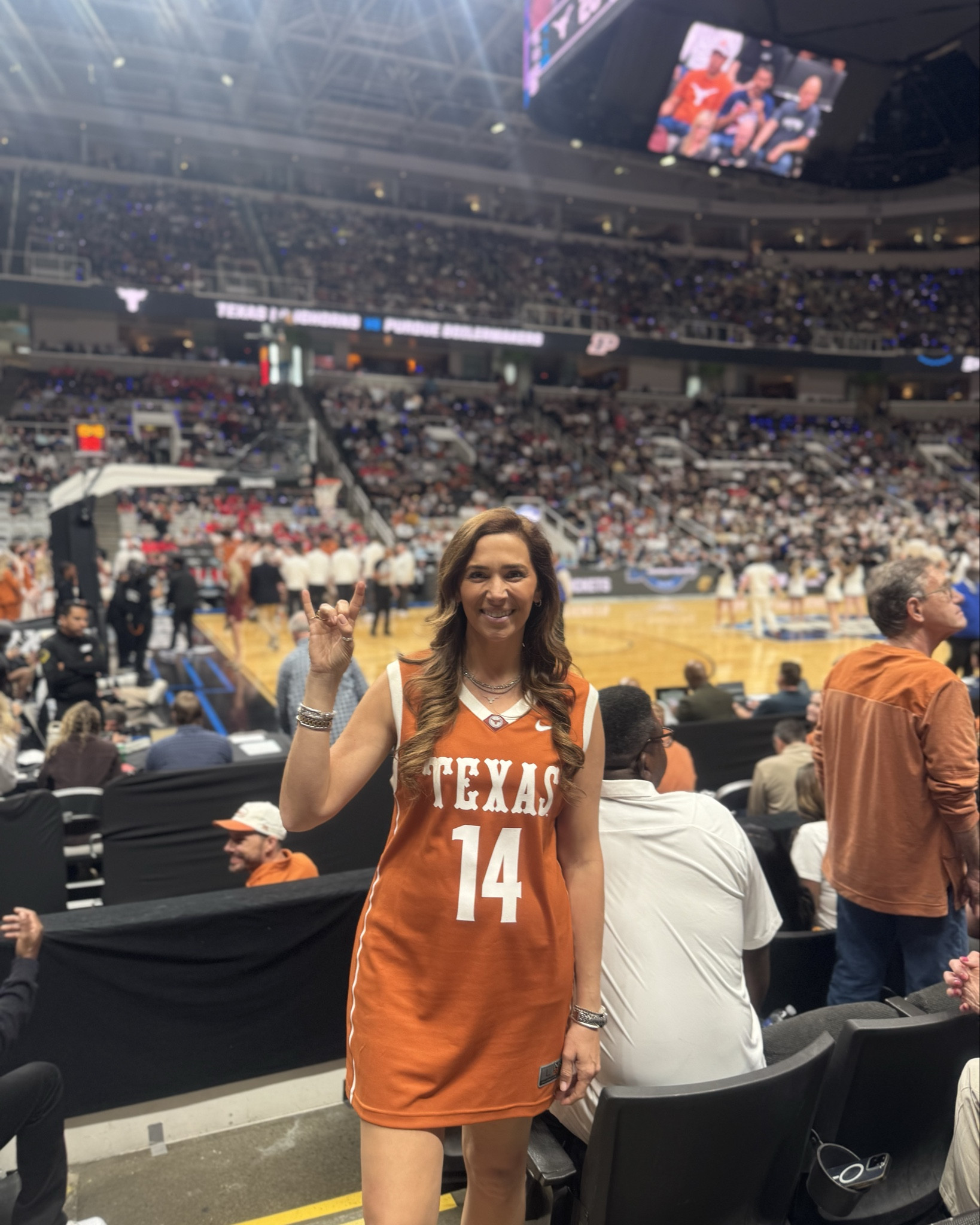 Sweet 16!! Cheering on @texasmbb in a $135 basketball jersey from @fanatics - wearing a large as a dress with the @nike Pegasus sneaks, @amazon sunnies & @ysl stadium compliant purse 🤘🏽🤘🏽🤘🏽