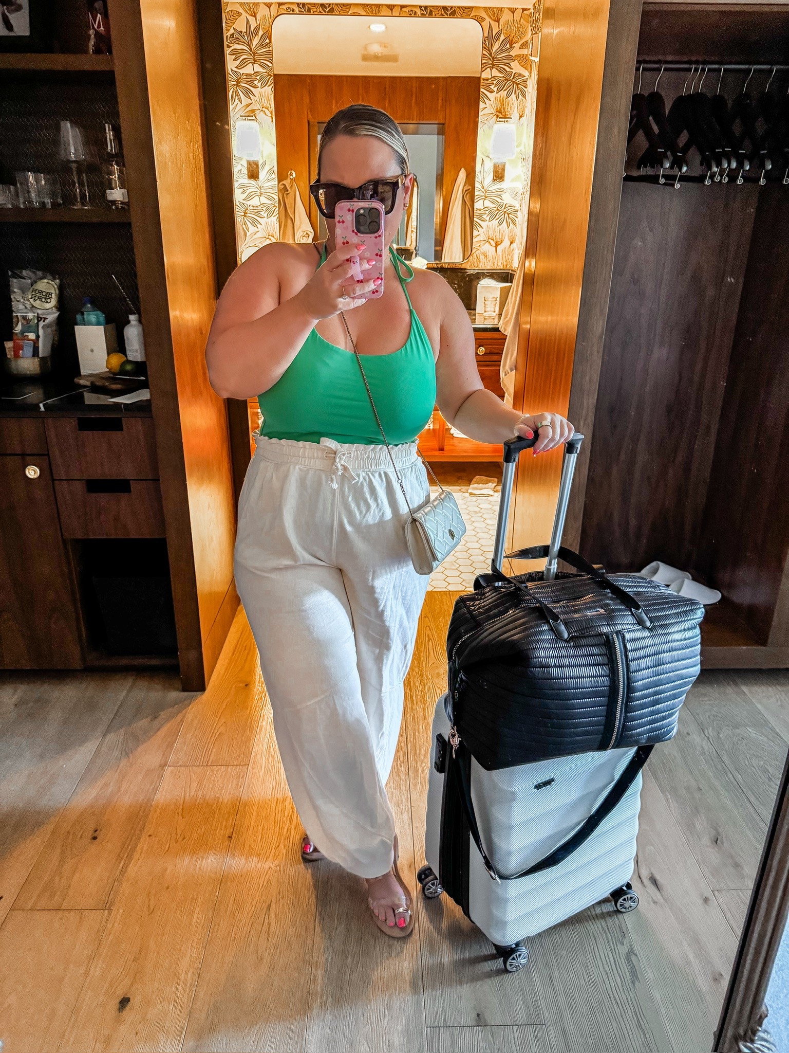 What I wore in Arizona! This was my travel outfit home. I absolutely love this green Aritzia top!! So flattering and such a pretty color and goes so well with these comfy pants from Aerie! 
Size XL in halter top, and size MEDIUM in the pants. 

Summer fashion, resort wear, summer style, summer outfit, travel outfit, women’s fashion, outfit inspo, midsize fashion, midsize style, petite fashion 

#LTKMidsize #LTKPetite #LTKStyleTip