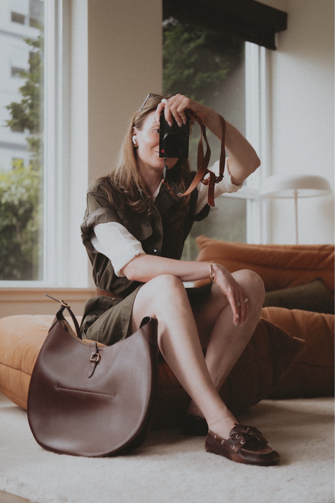 OOTDMini dress (here an olde G-star Raw)  layered over a long sleeve shirt (Everlane silk shirt) + boat shoes (Miu Miu) + hobo bag (Polo ID large saddle bag in Acorn brown)

#LTKootd #LTKSeasonal #LTKWorkwear