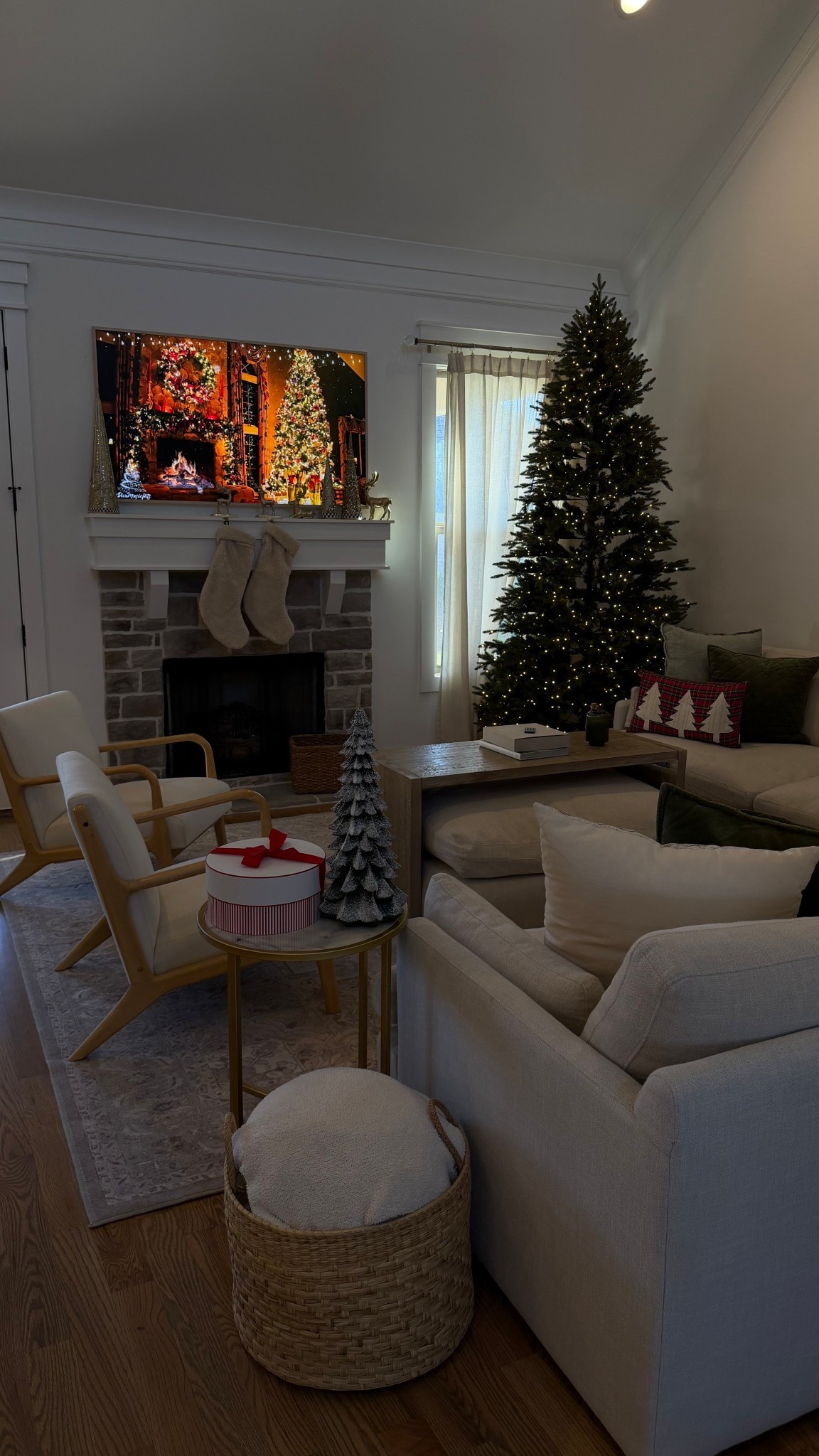 Decorated our living room for Christmas and love how cozy it is! This viral pre-lit Christmas tree is even better in person 🎄 so easy to set up!

#LTKSeasonal #LTKHoliday