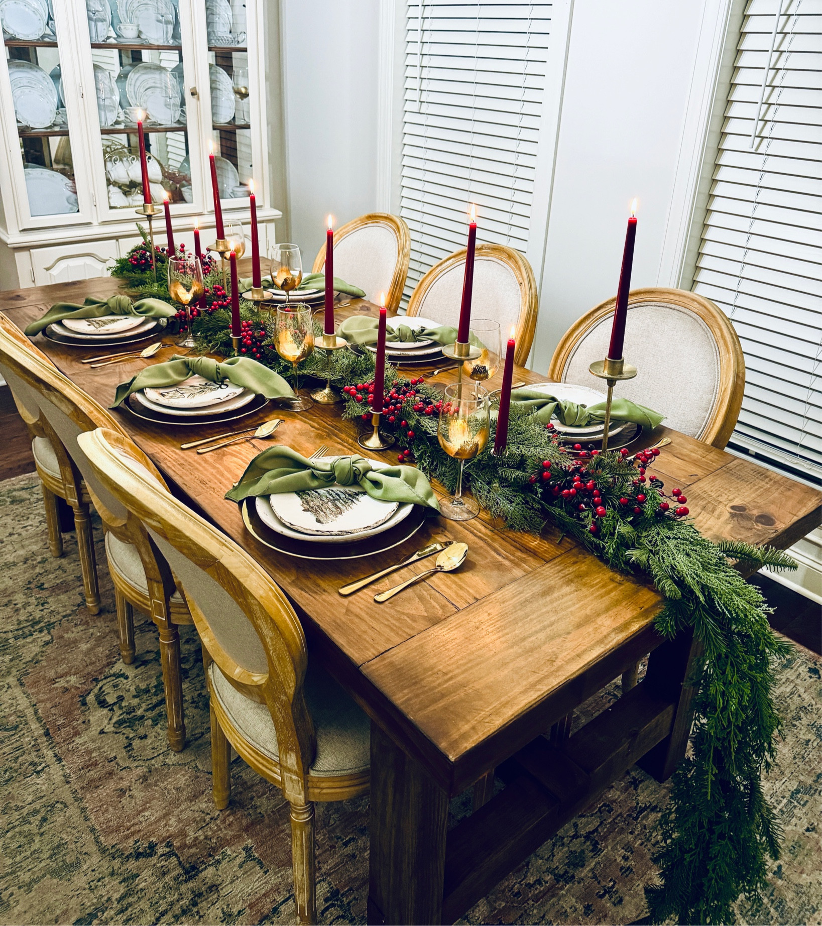 Class Christmas tablescape. Table decor with classic red and green. Garland table runner 

#LTKHome #LTKHoliday #LTKSeasonal