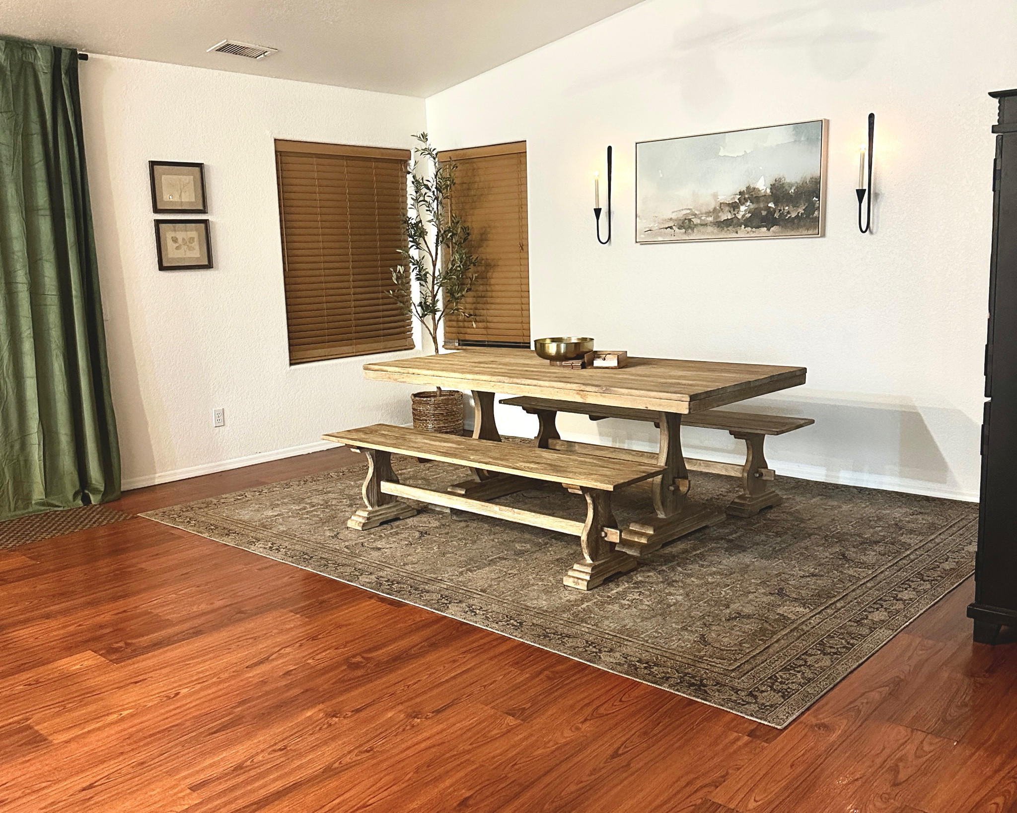 Loving these sconces from World Market! The olive tree is from Walmart, Rug is Loloi from Amazon and the large picture is from Target! My dining table was a score from marketplace and the two pictures on the left were thrifted. This rental is finally coming together!

#LTKHome #LTKSeasonal #LTKFindsUnder50