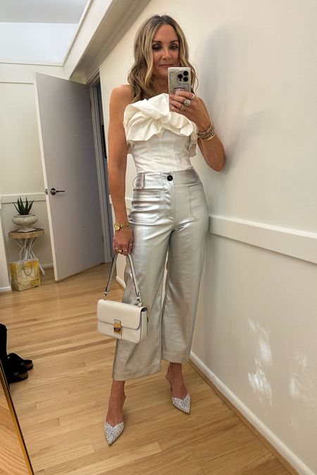Fashion show ootd! Statement white corset top, silver metallic pants, date night outfit, party outfit, Anthropologie, other stories, Radley London bag, holiday outfit 

#LTKHoliday #LTKstyletip #LTKparties