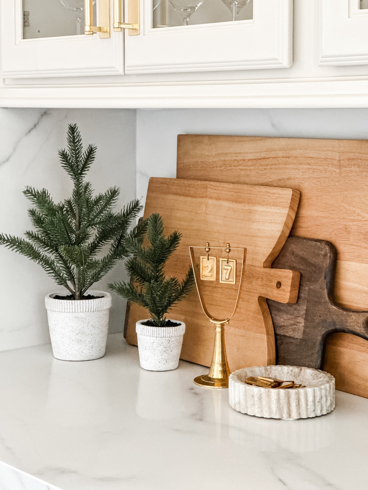27 days till Christmas!! My cute countdown brass calendar is such a cute alternative to the advent calendar. Trees are from last year but I linked this years version from Target. All cutting boards / charcuterie boards are target 

#LTKHome #LTKFindsUnder50 #LTKCyberWeek