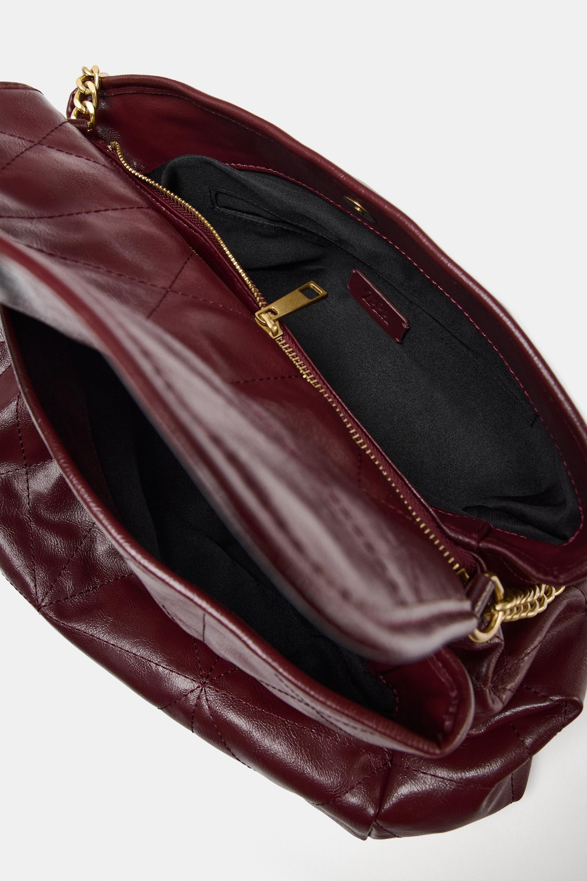 Shopper shoulder bag. Shoulder strap with metal chain in a mix of materials. Interior compartment... | Zara US