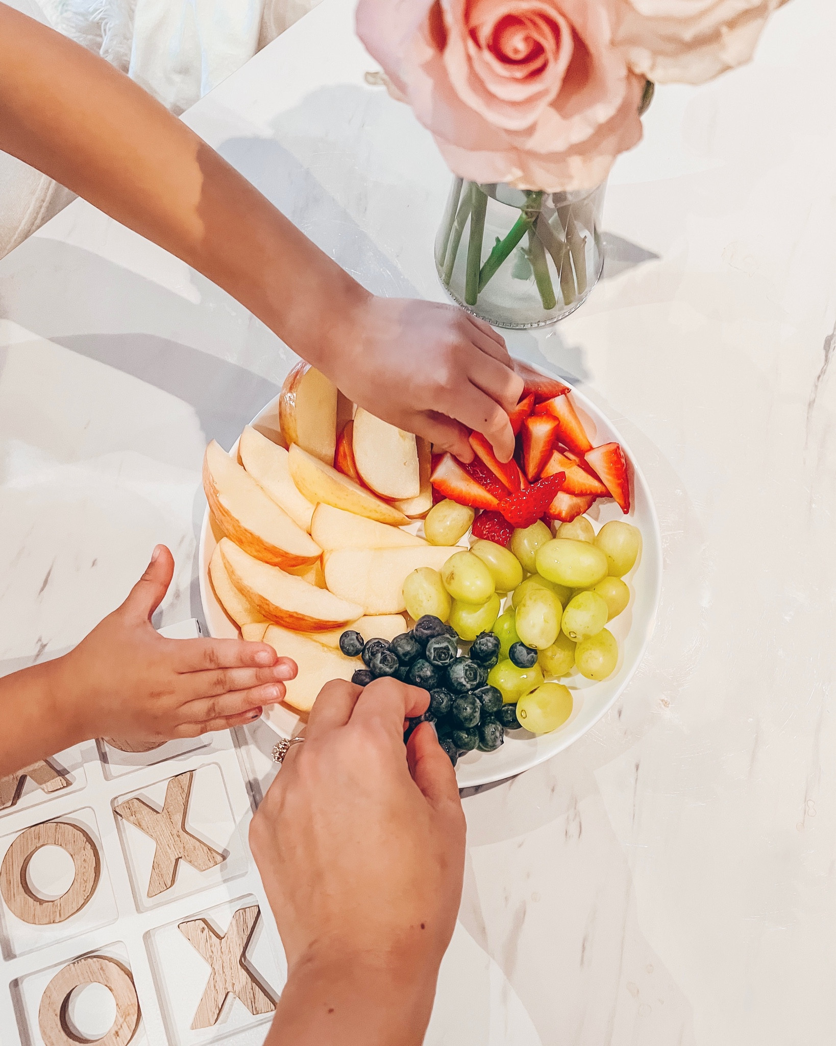 Snack time with my girls ☺️ Love my white marble coffee table and our tic tac toe game, perfect in time for Valentine’s Day! Neutral home decor. White decor. 

#homedecor #ltkfamily #livingroom #livingroomdecor #coffeetable #whitedecor #trend #trending #whitetable #marbletable #targetfind #ltkunder50

#LTKFind #LTKhome #LTKunder100