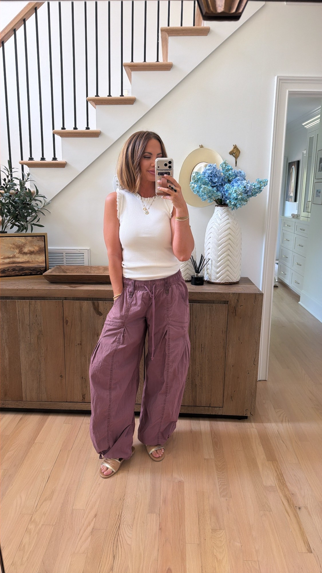 amazon ruffle tank, and urban outfitters pants. code betsy works for goldie lew ♥️

#LTKootd #LTKSaleAlert #LTKBeauty