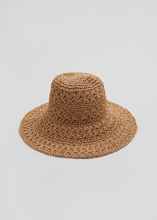 DESIGNED IN PARIS
      Crochet Straw Hat
      
         
			$49
	

		

      
      
      
   ... | & Other Stories US